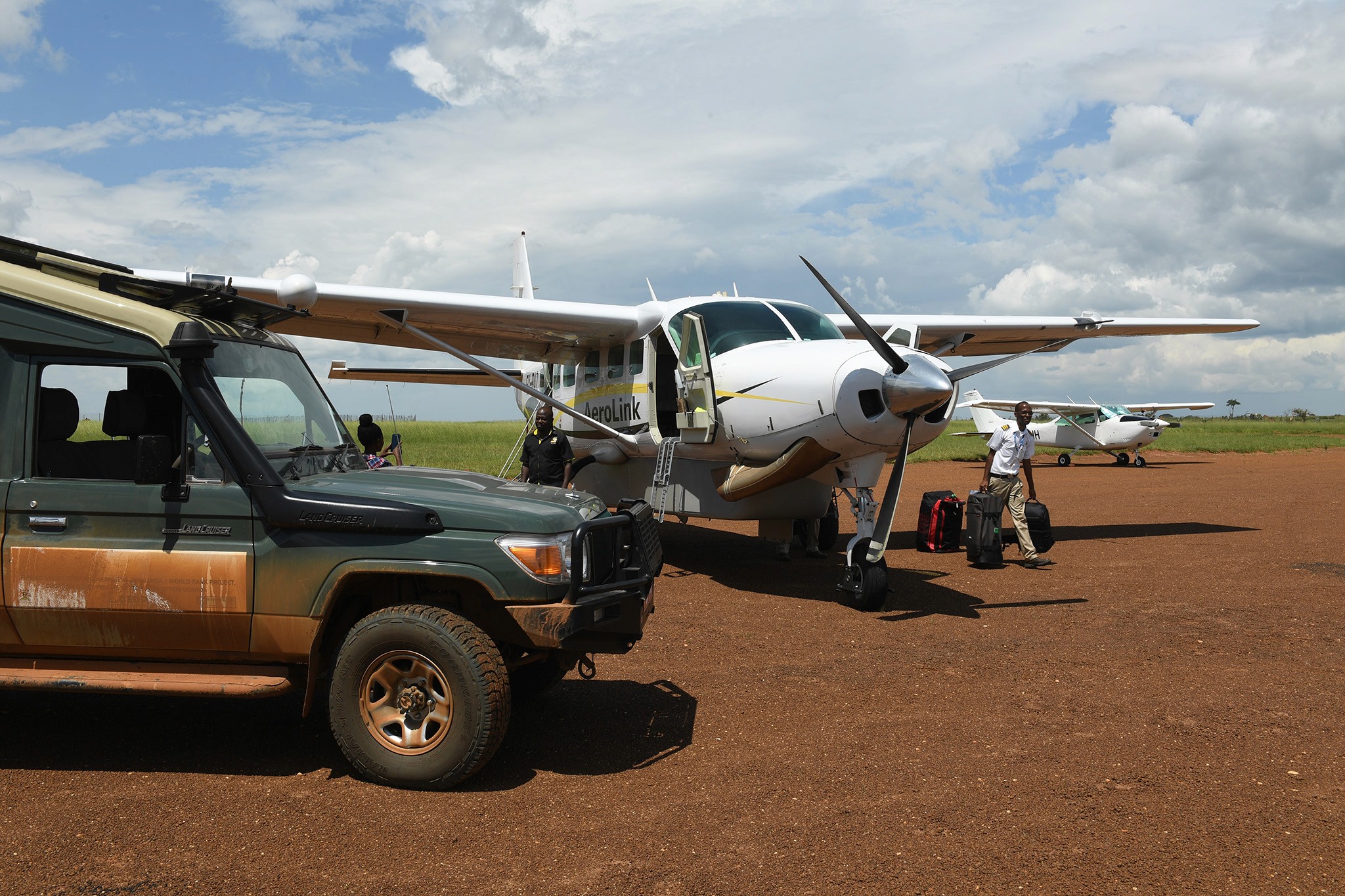 Tourists arriving at Kasese Airtsrip ahead of their Queen E;izabeth National Park Safari