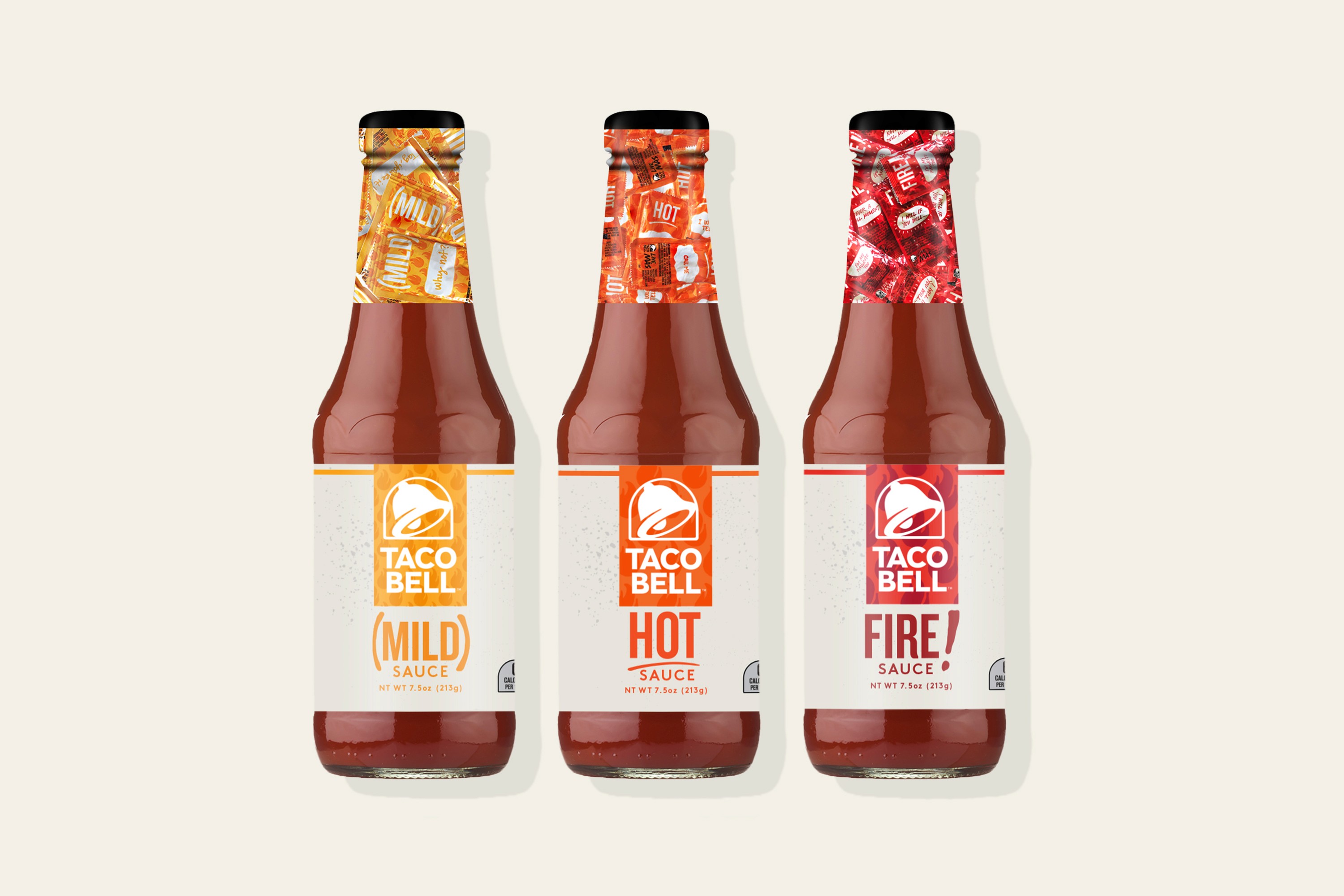 Taco sauce bottles lineup on white background