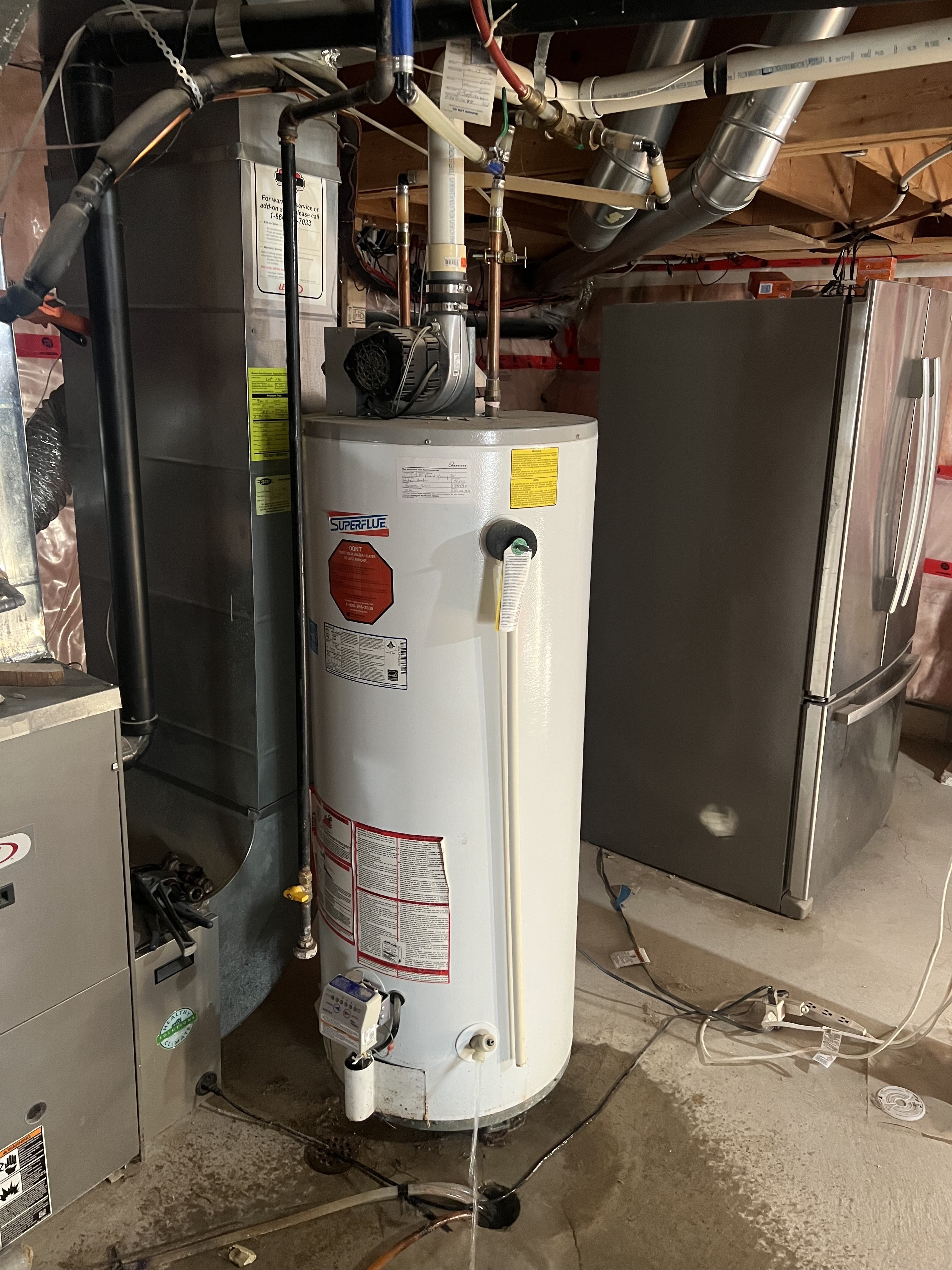 Tankless water heater installed in a Mississauga basement