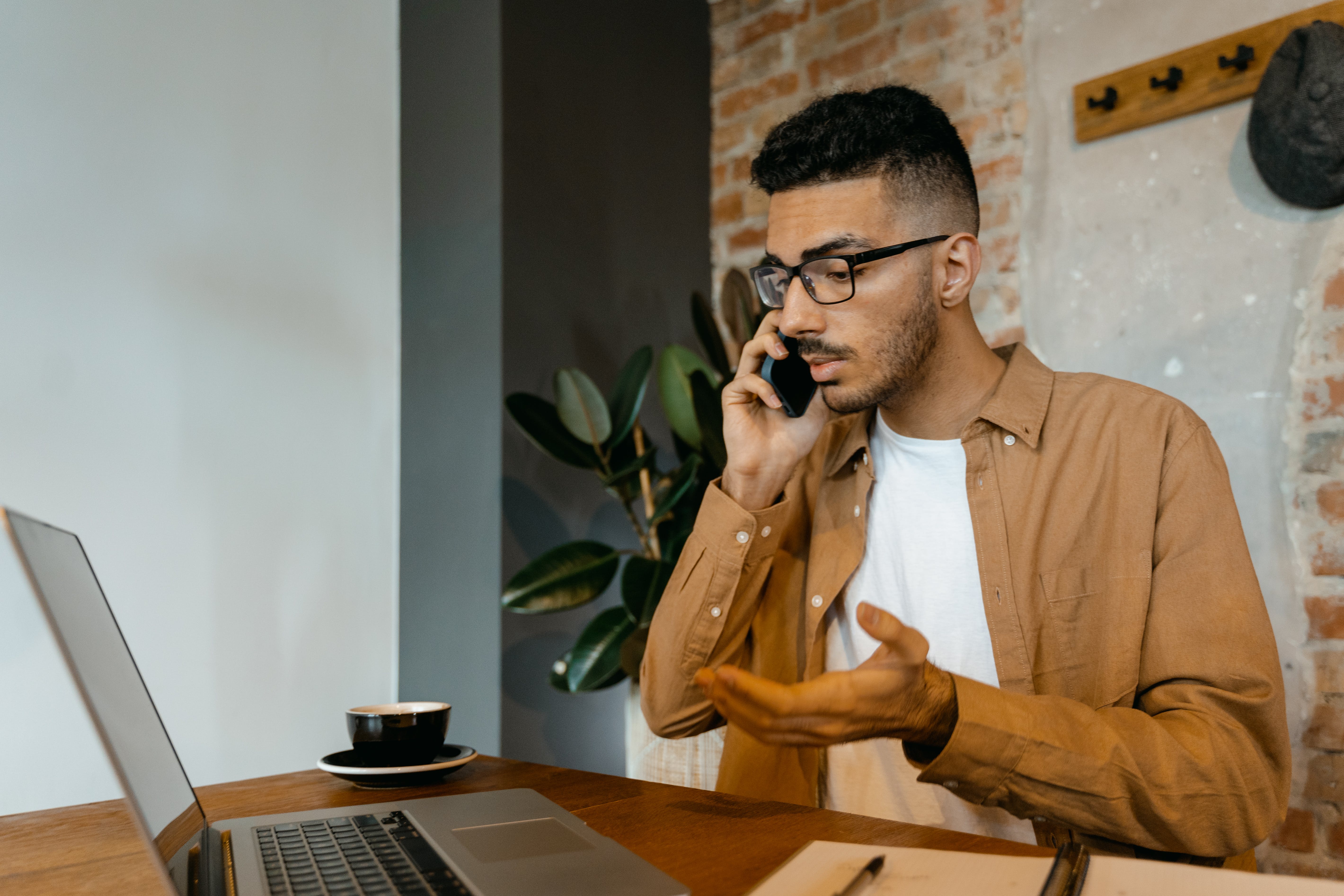 Man contacting a prospect through phone call