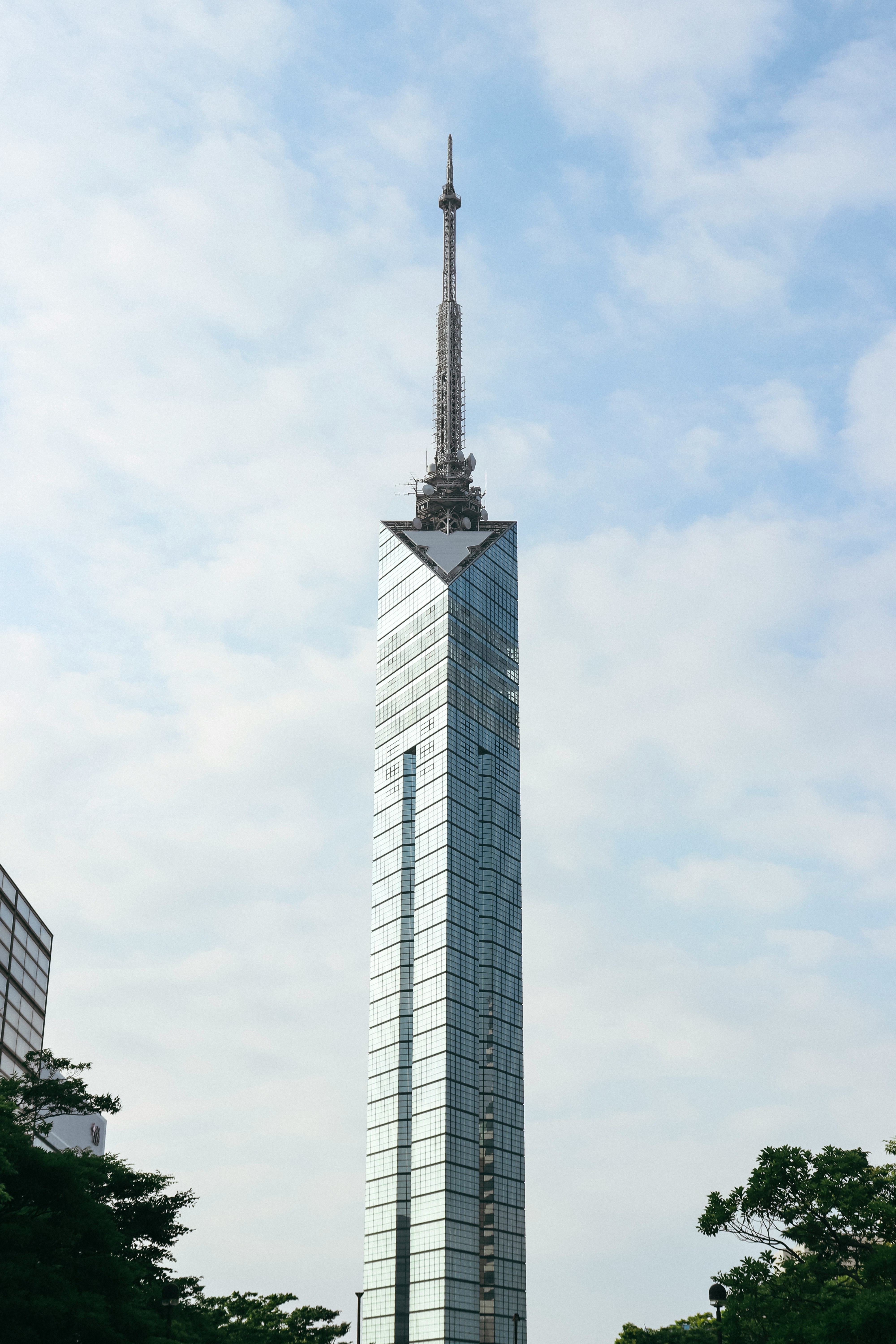 a very tall building with a very tall spire