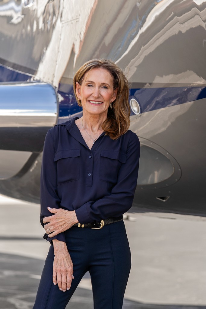 person sitting in a chair in front of a man