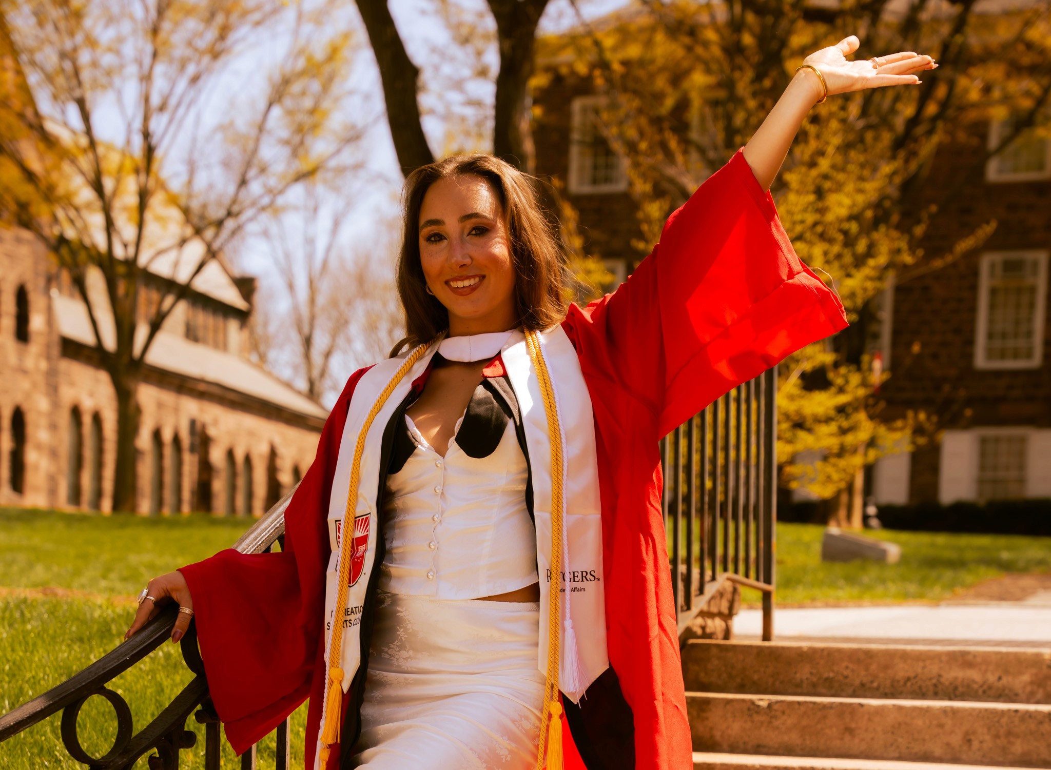 Professional headshot of a person in a formal setting.