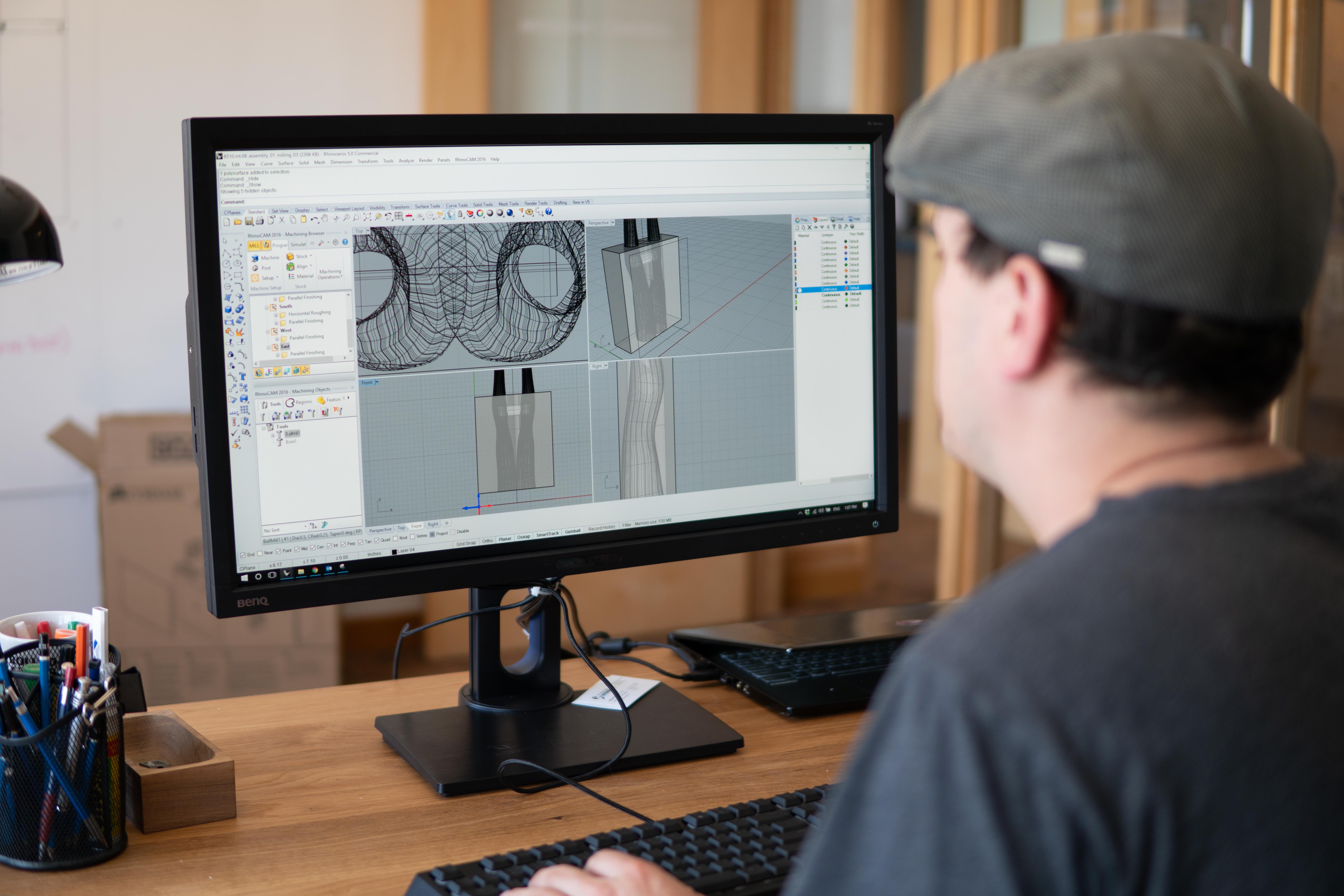 a person modeling a mannequin in 3d software
