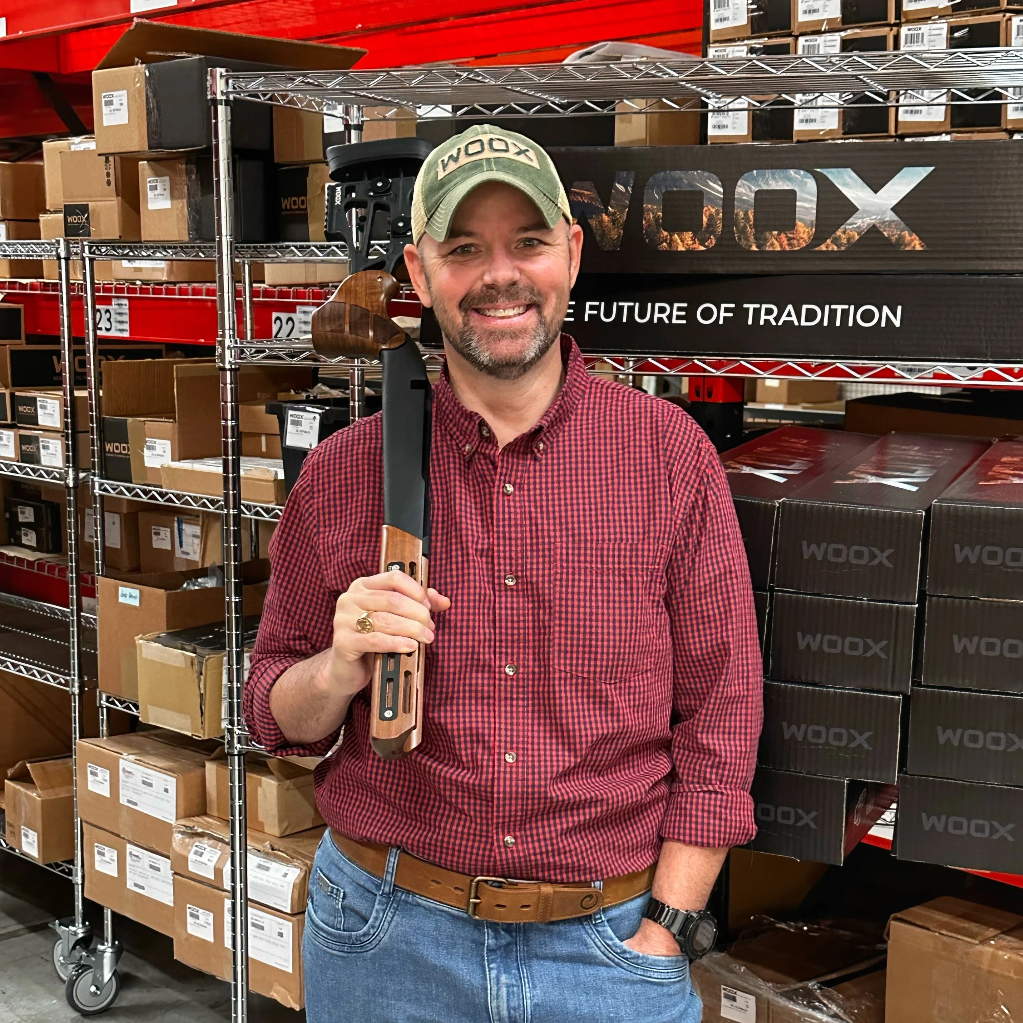 Chip Hunnicutt holding a WOOX firearm