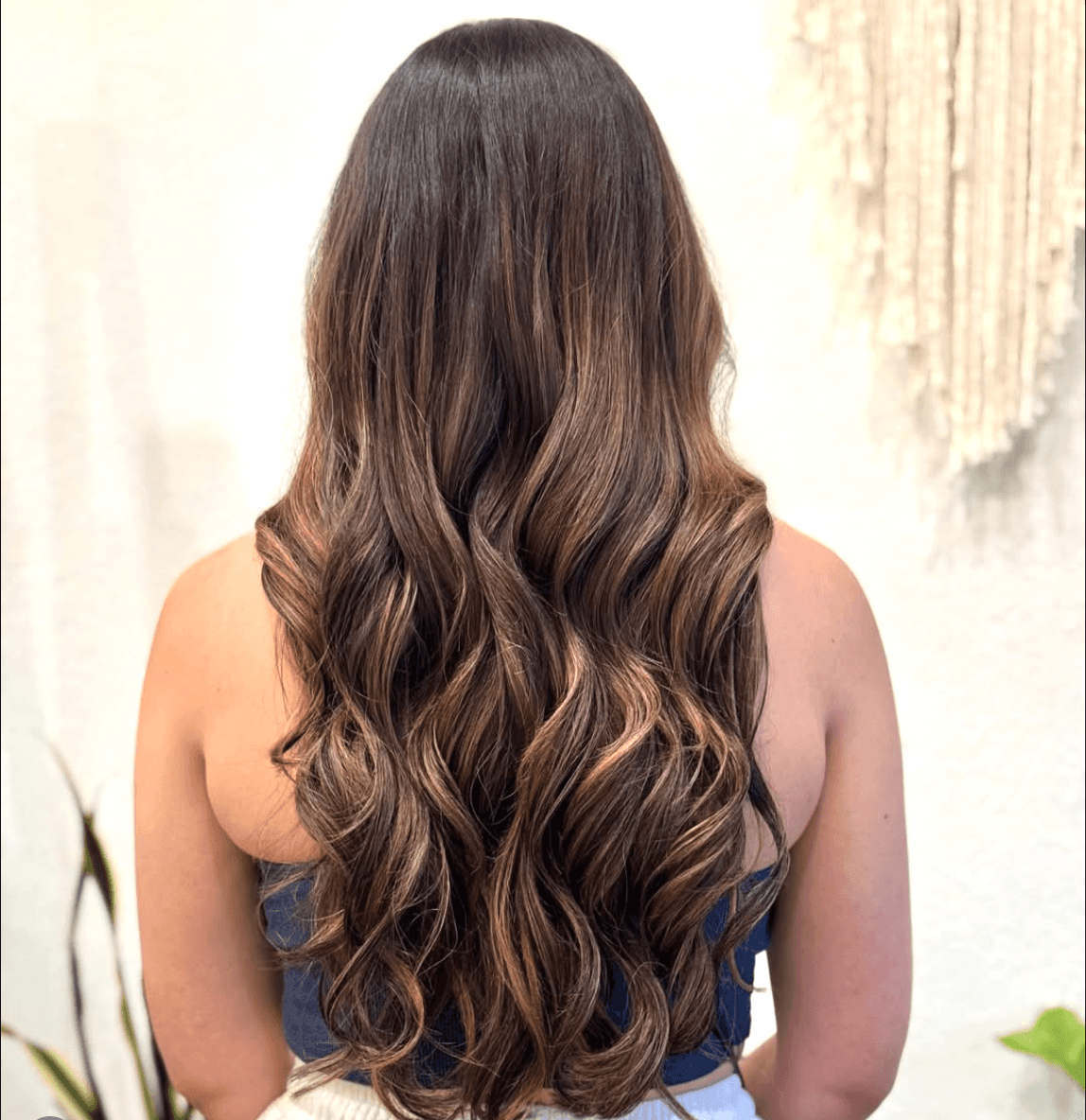 Dimensional brunette color melt with weft extensions by Tannya Speir at Del Sol Hair Studio Huntington Beach