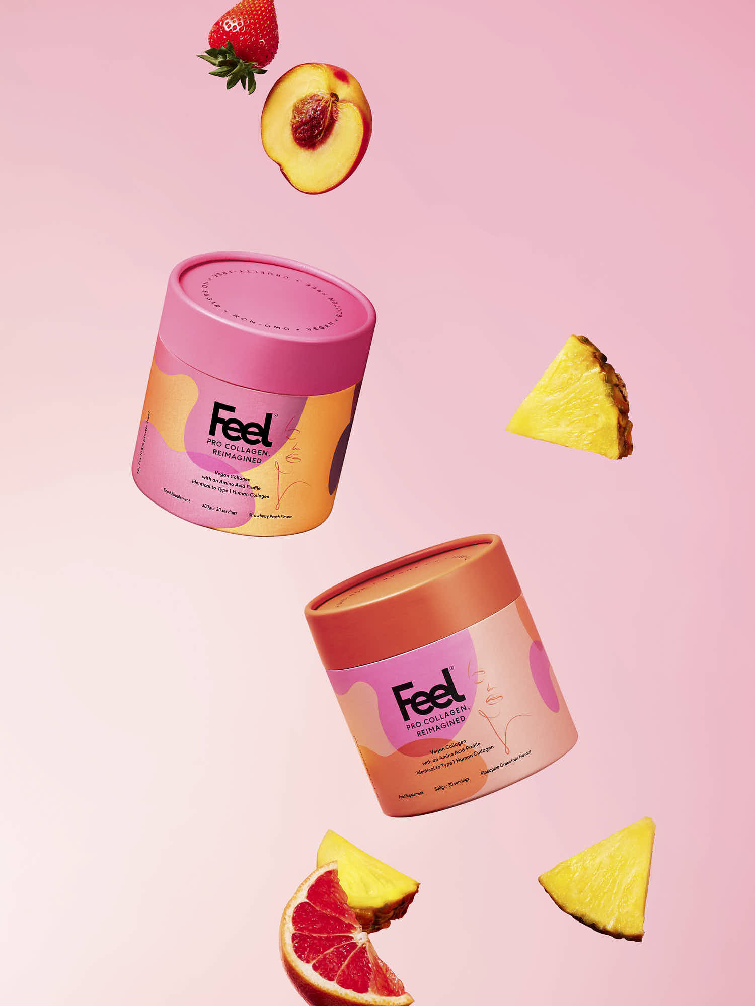 Two colorful jars of skincare products float against a pink background, surrounded by fruit slices.