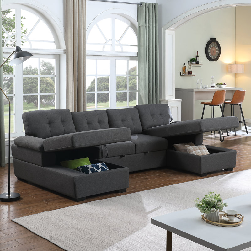 Spacious double couch with reversible chaise and built-in storage, ideal for versatile seating and sleeping options.