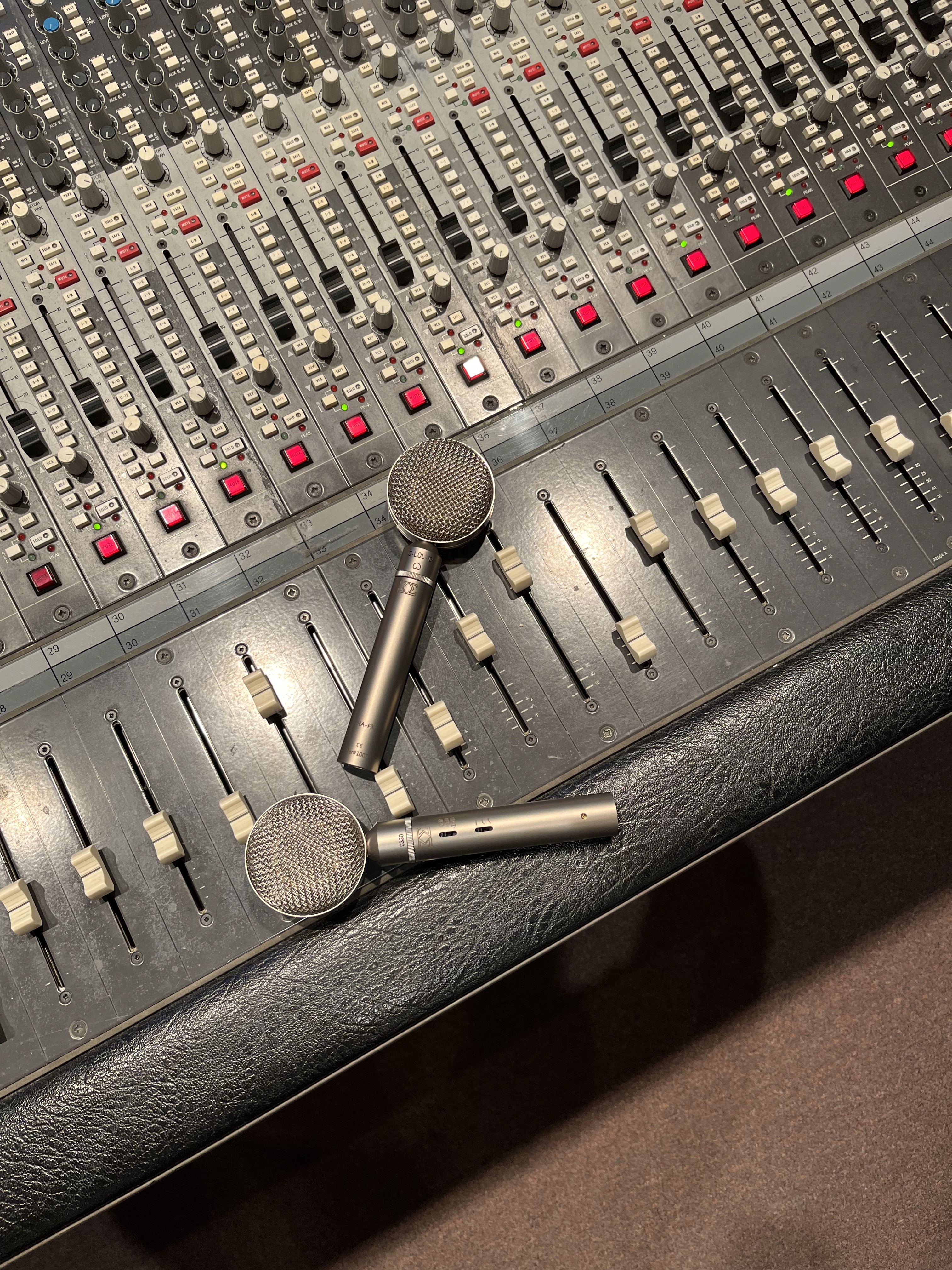 C-LOL 12 FX Microphones resting on SSL Console