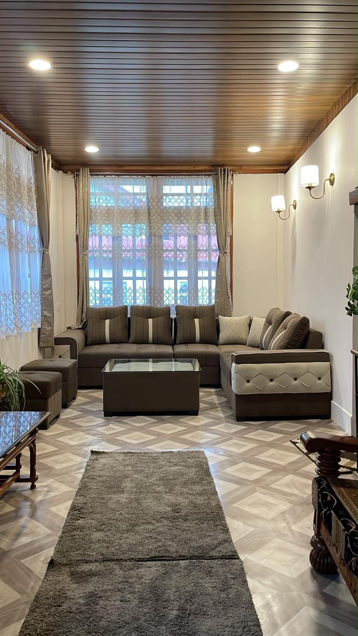 white mattress beside sectional sofa