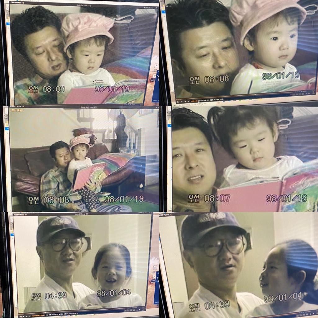 a blurry photo of a person standing in front of a wall