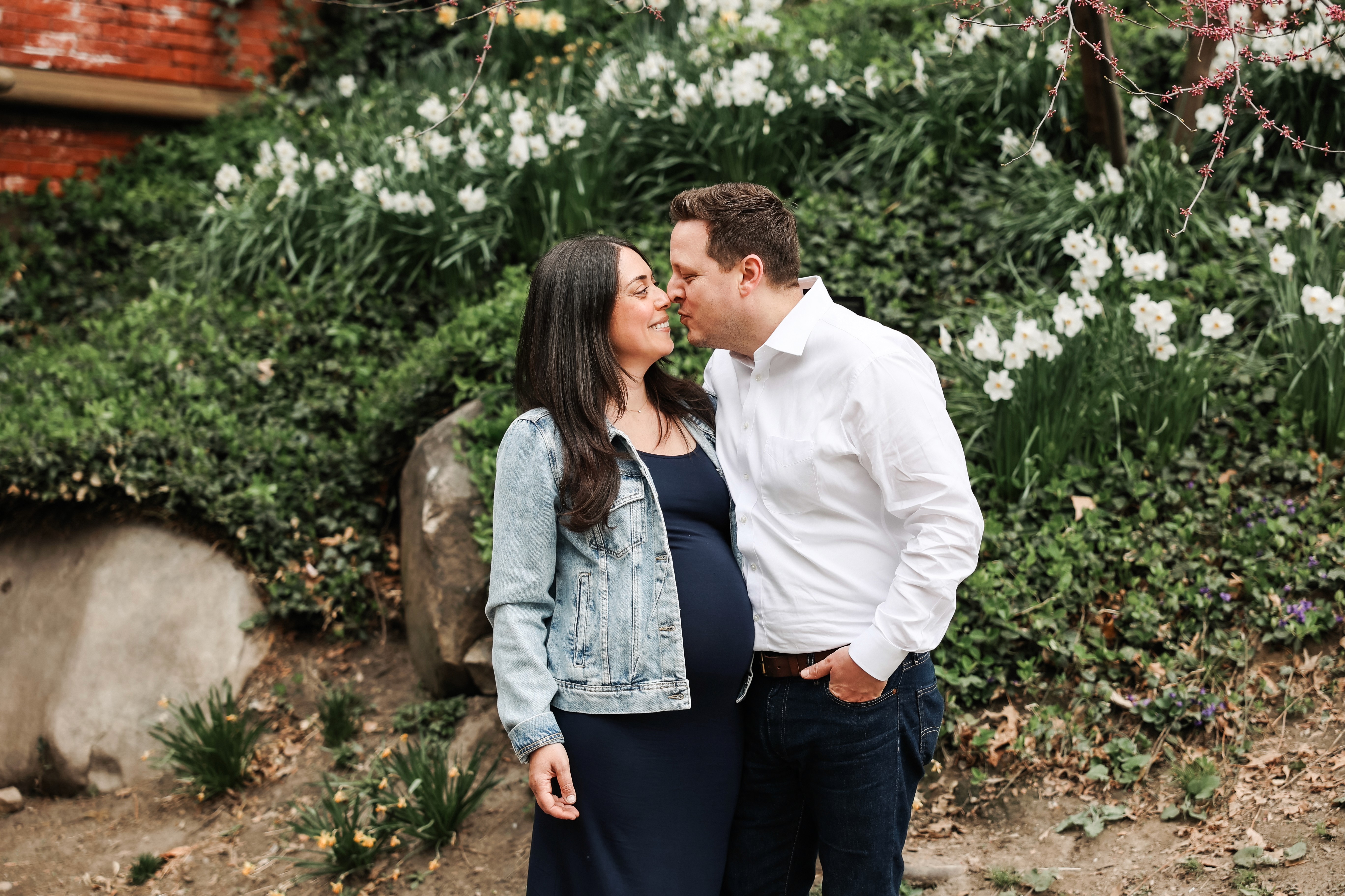 Mom, dad and their two boys all smiling at the camera at Bethesda Terrace in Central Park, NYC — a New Jersey family making memories in the city with Lizz Spano Photography, New York City family photographer.