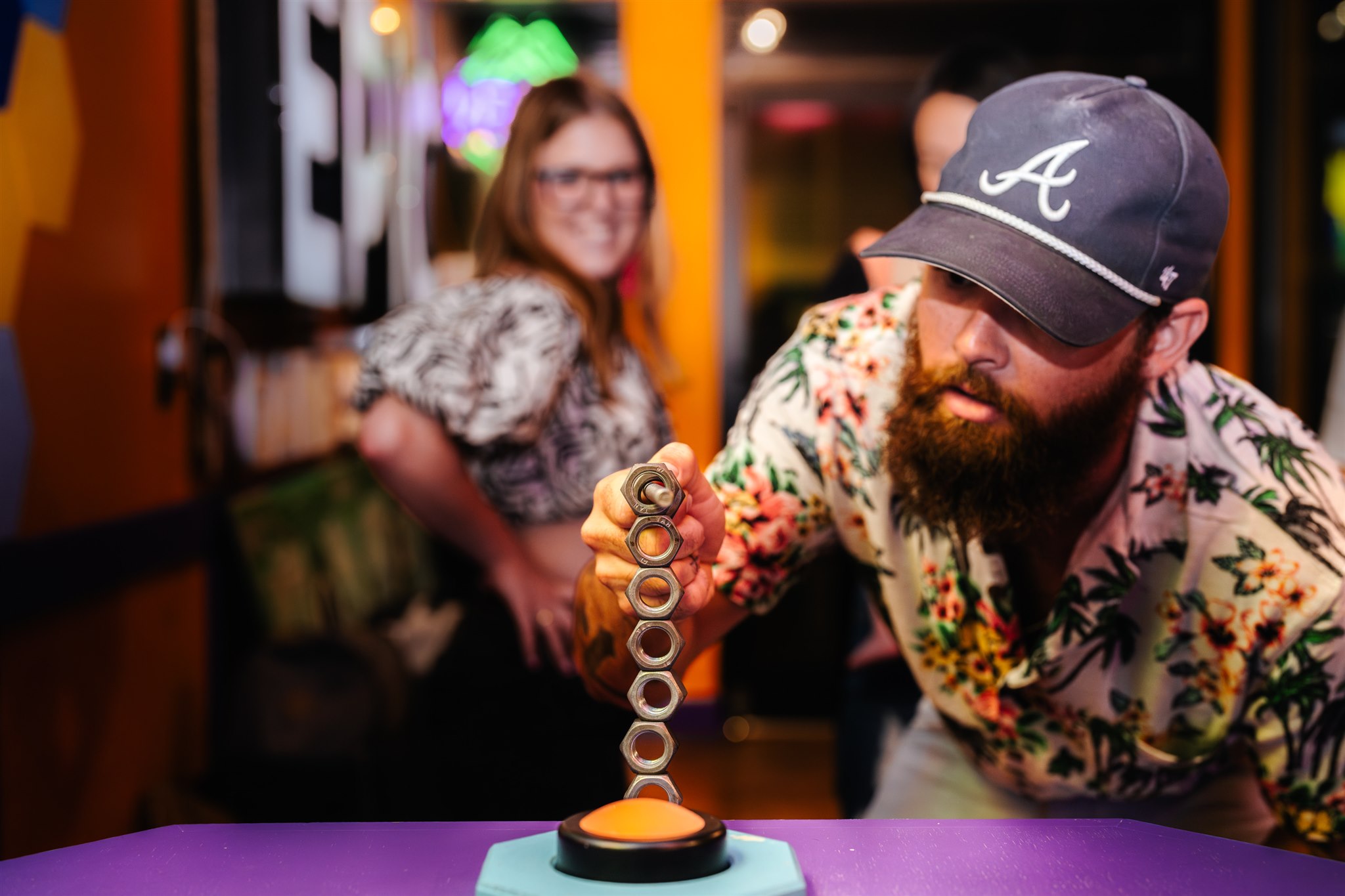 Man hitting button at game show