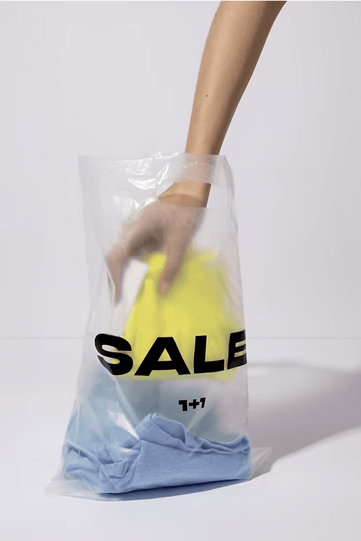 Hand In A Shopping Bag
