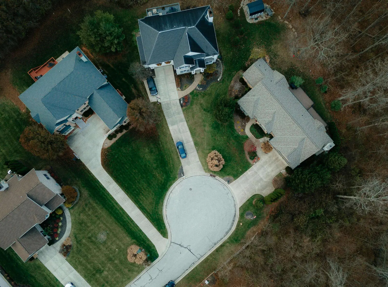 Aerial drone view of suburban homes showing lot layouts for a residential property survey