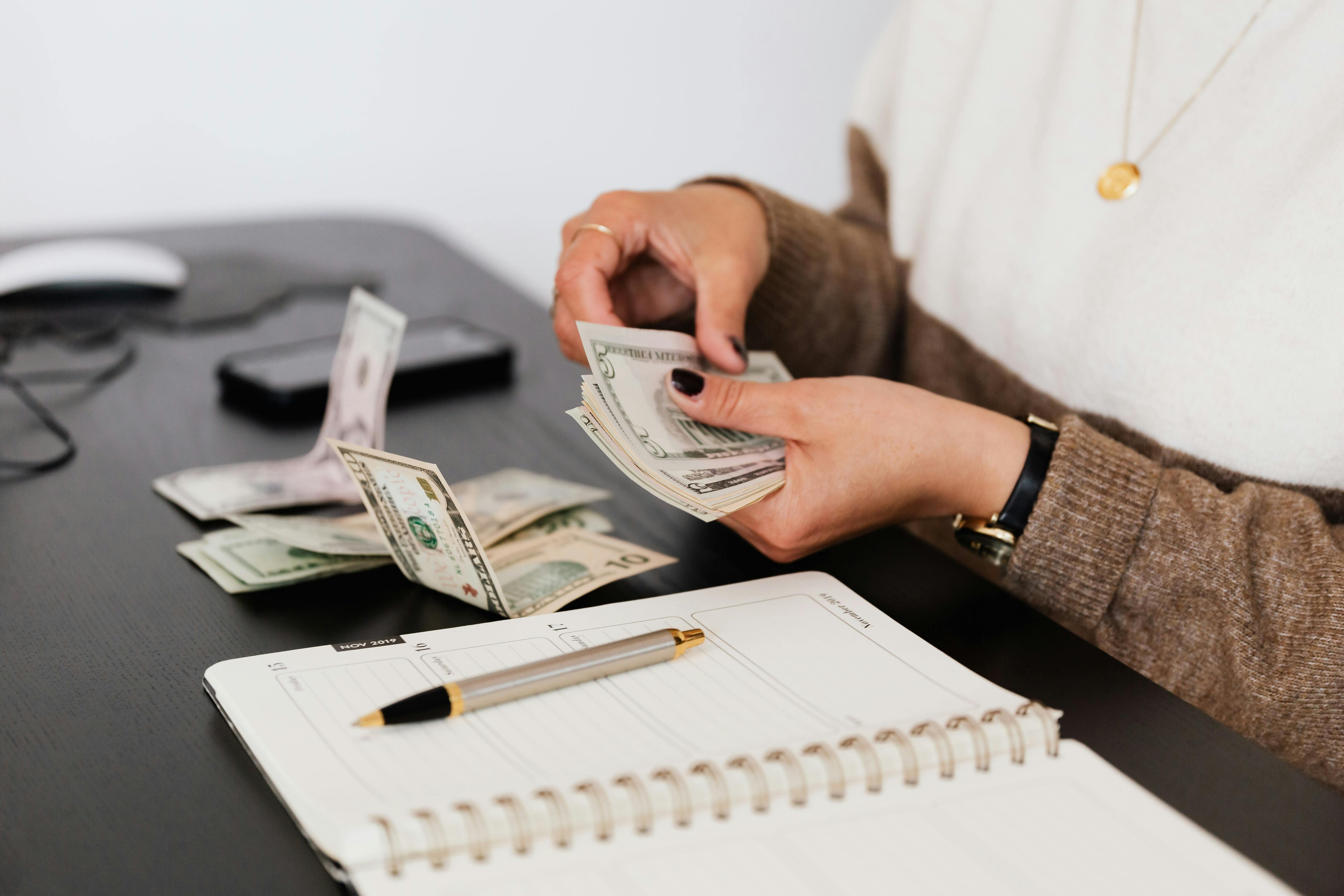 Mortgage advisor holding her earnings