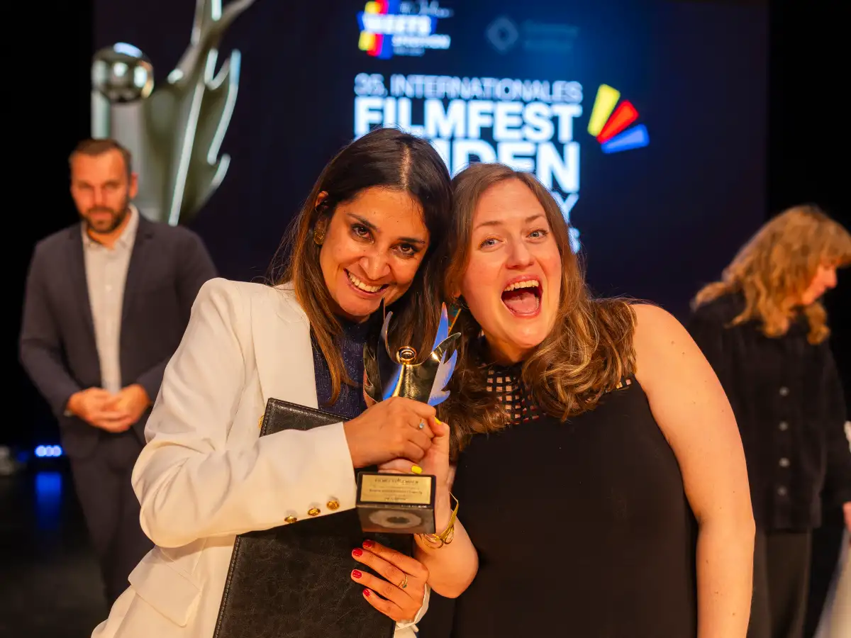 Director accepting an award.