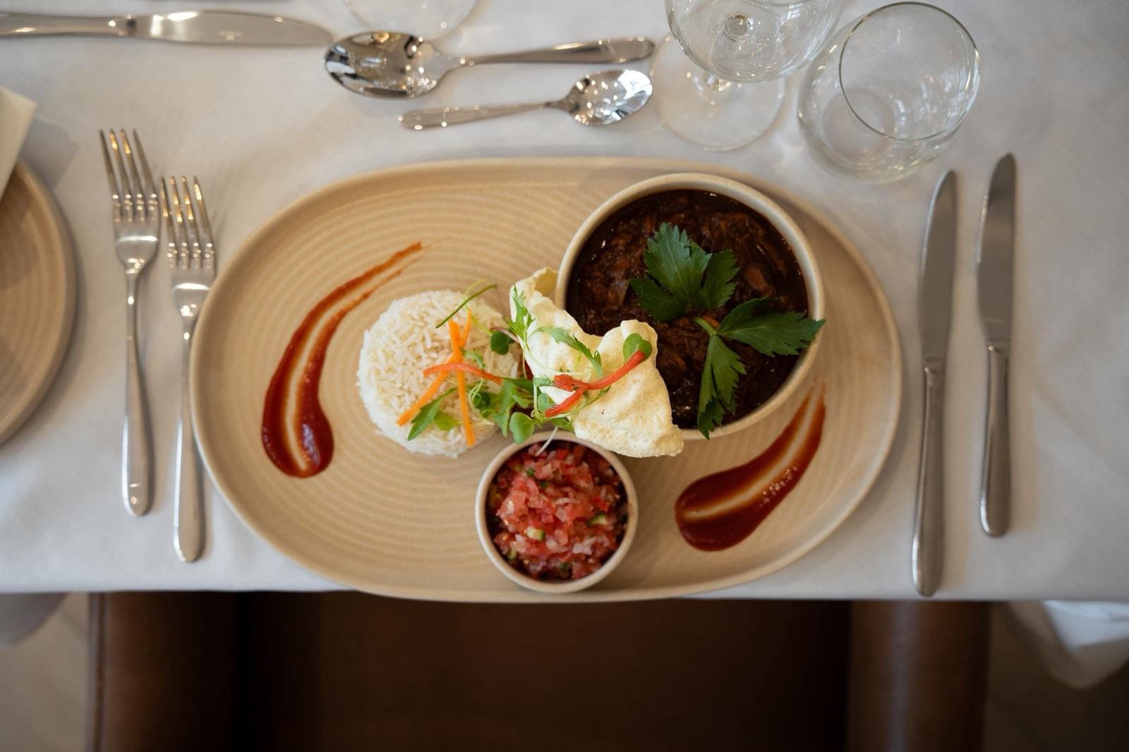 shaded-terrace-with-arched-ceilings-and-hanging-lamp