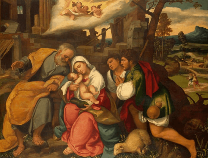 A group of people, including a woman and a child, gather around a natural setting, conveying a sense of intimacy and care.