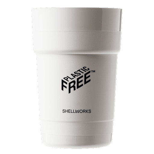 A white reusable cup boldly reading 'PLASTIC FREE' made by Shellworks. It demonstrates the structural versatility of VIVOMER, replacing petrochemical plastics with a microplastic-free, high-performance biomaterial.