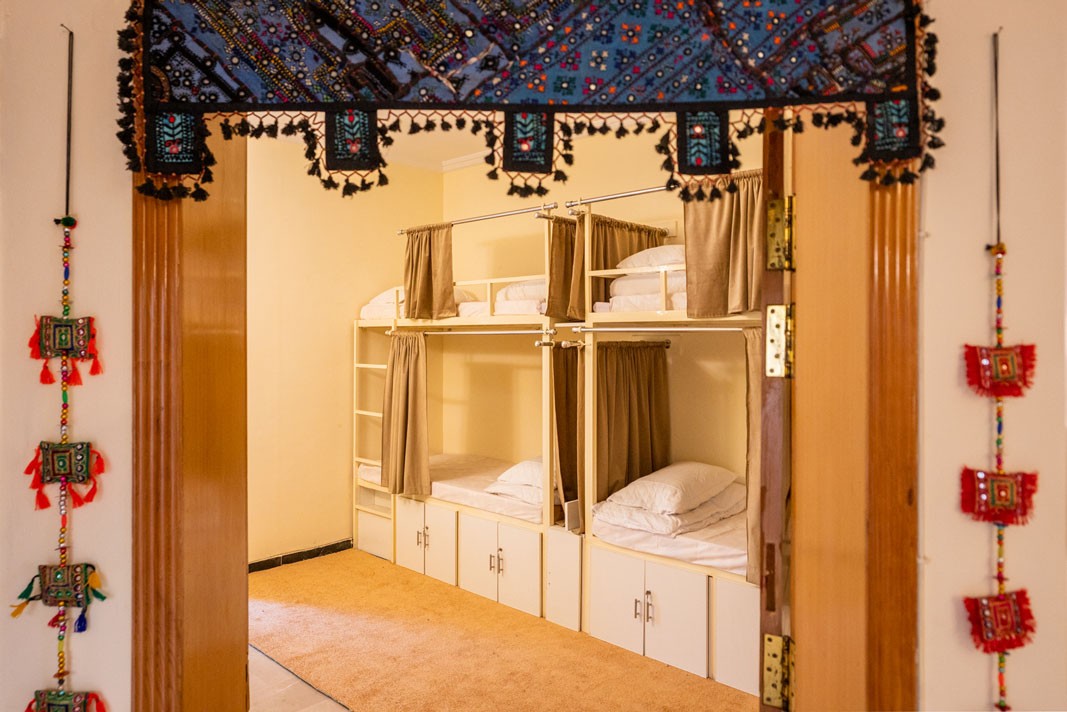 Bunk beds in the Kalash dorm room at Coyote Den Hostel Islamabad, Pakistan