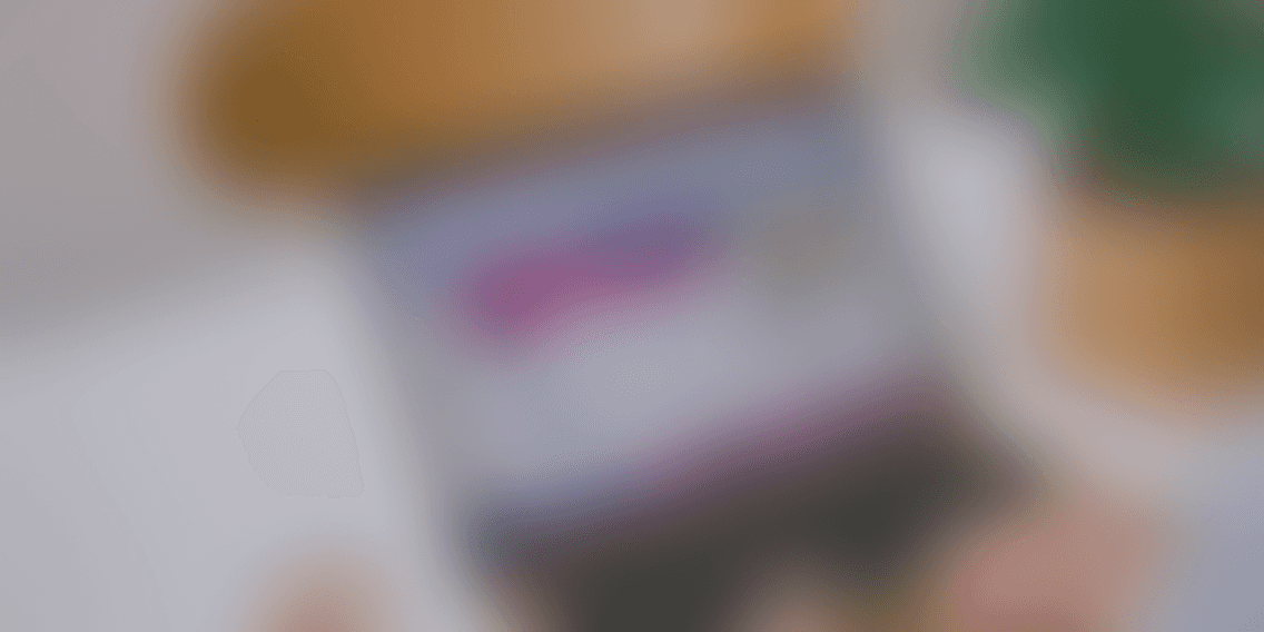 Modern spiral staircase with wooden accents and lighting