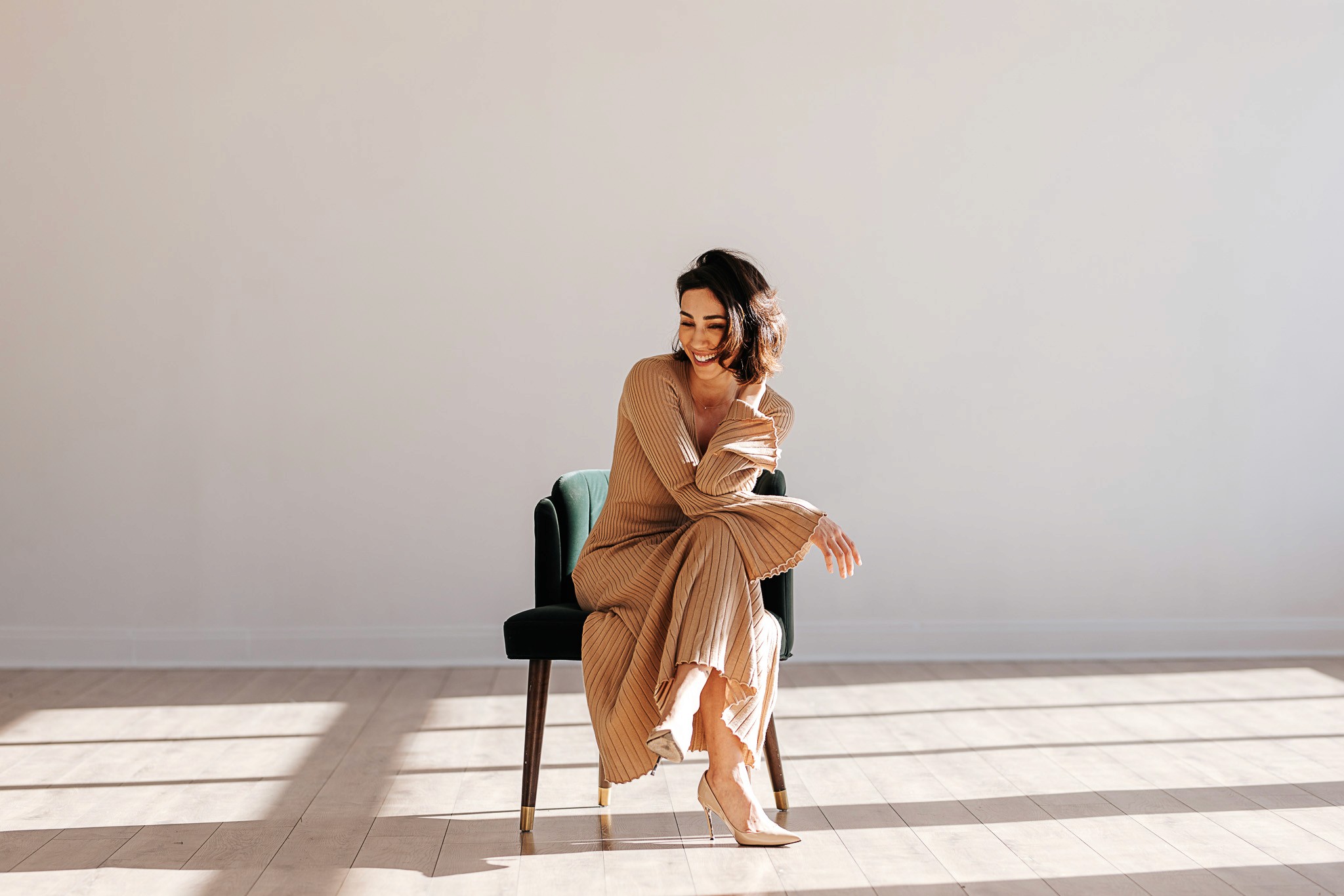 kids lying on a glass land and smiling