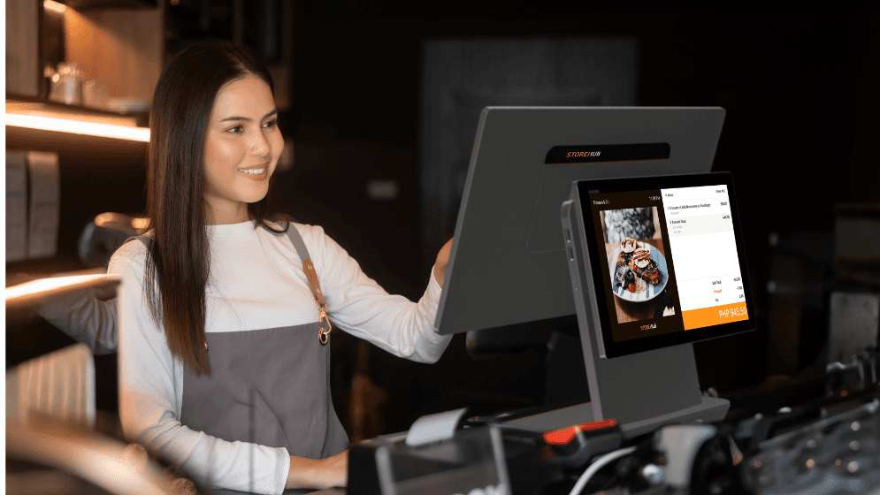 A store staff using a POS system