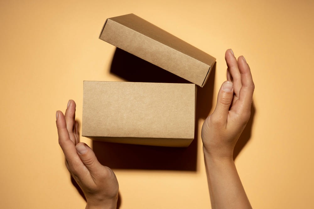 Hands holding packaging prototype