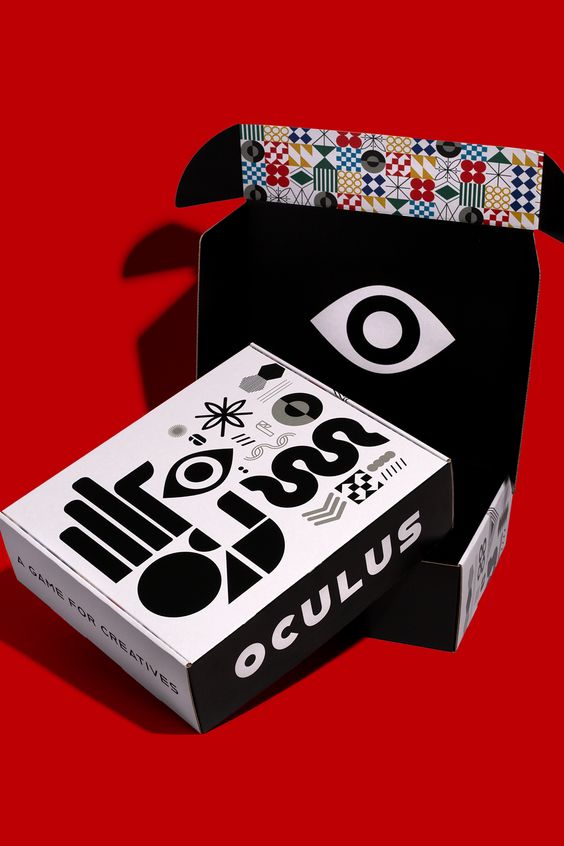 Close-up view of an angled red-orange “CONCEPT” shipping box showing the white ODE logo on its lid and the word “CONCEPT” along its side, against a pale peach background.