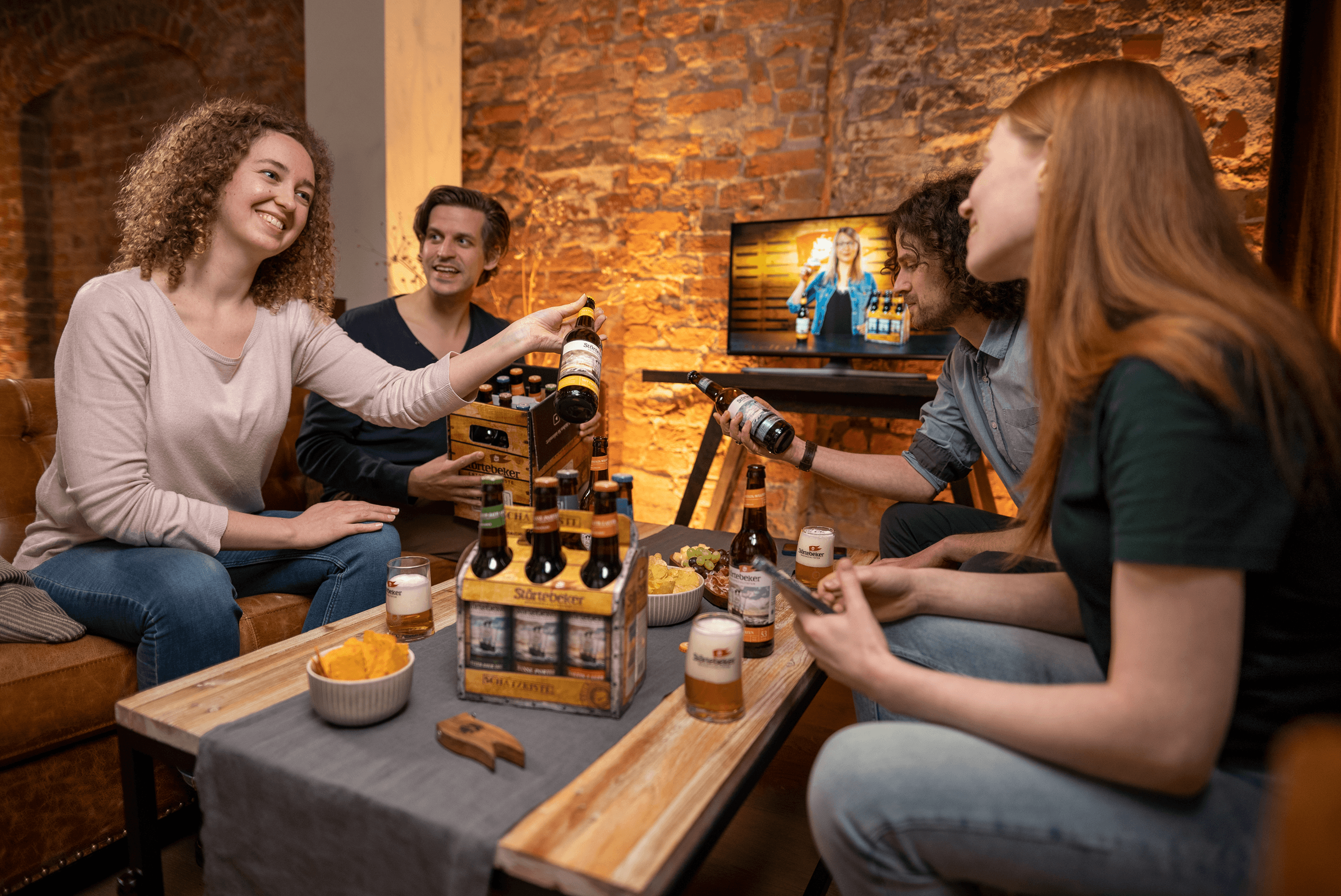 Friends sharing beer and watching TV