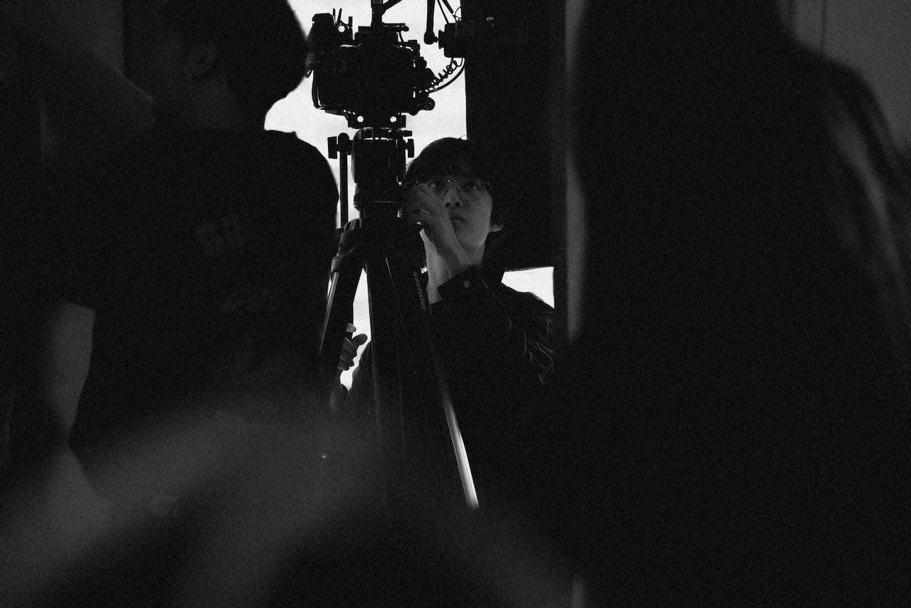 the director of photography handling with the camera