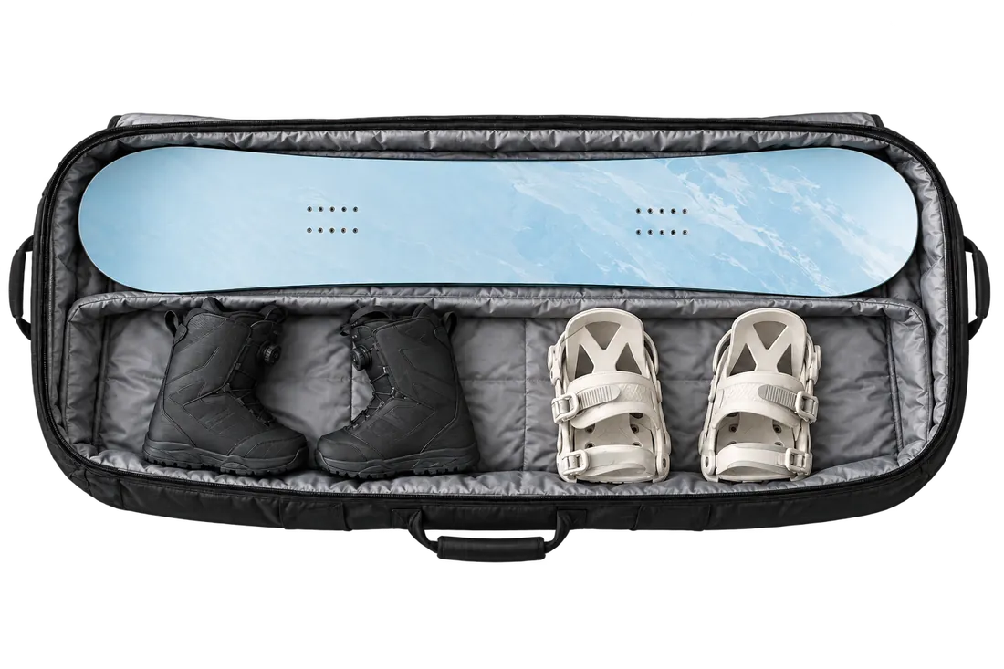 Open snowboard bag with a board, boots and bindings