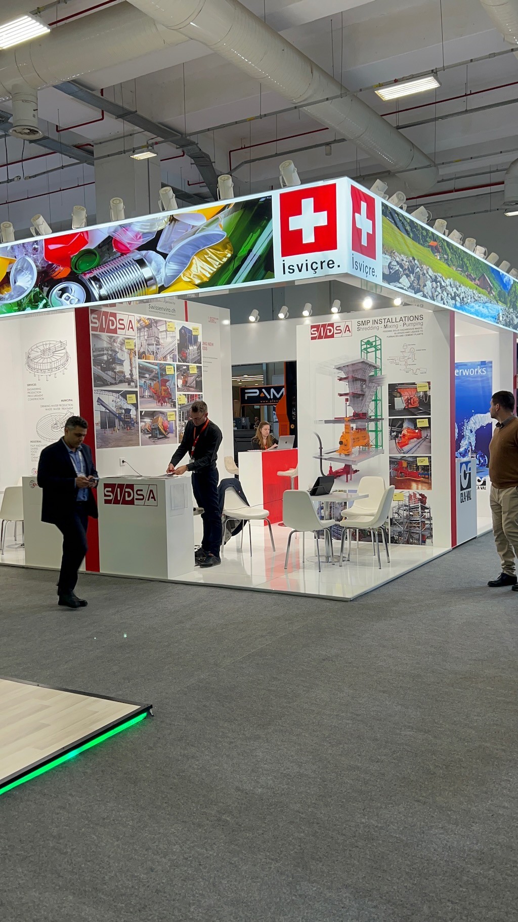 Premium branded area for the Gold Sponsor within the Swiss Pavilion, featuring high‑quality graphics and a modern design.