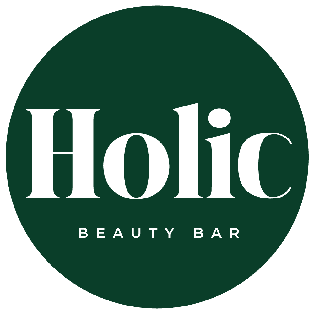 A 3D-rendered rounded square with an iridescent purple and pink gradient, glossy finish, and smooth reflective highlights.