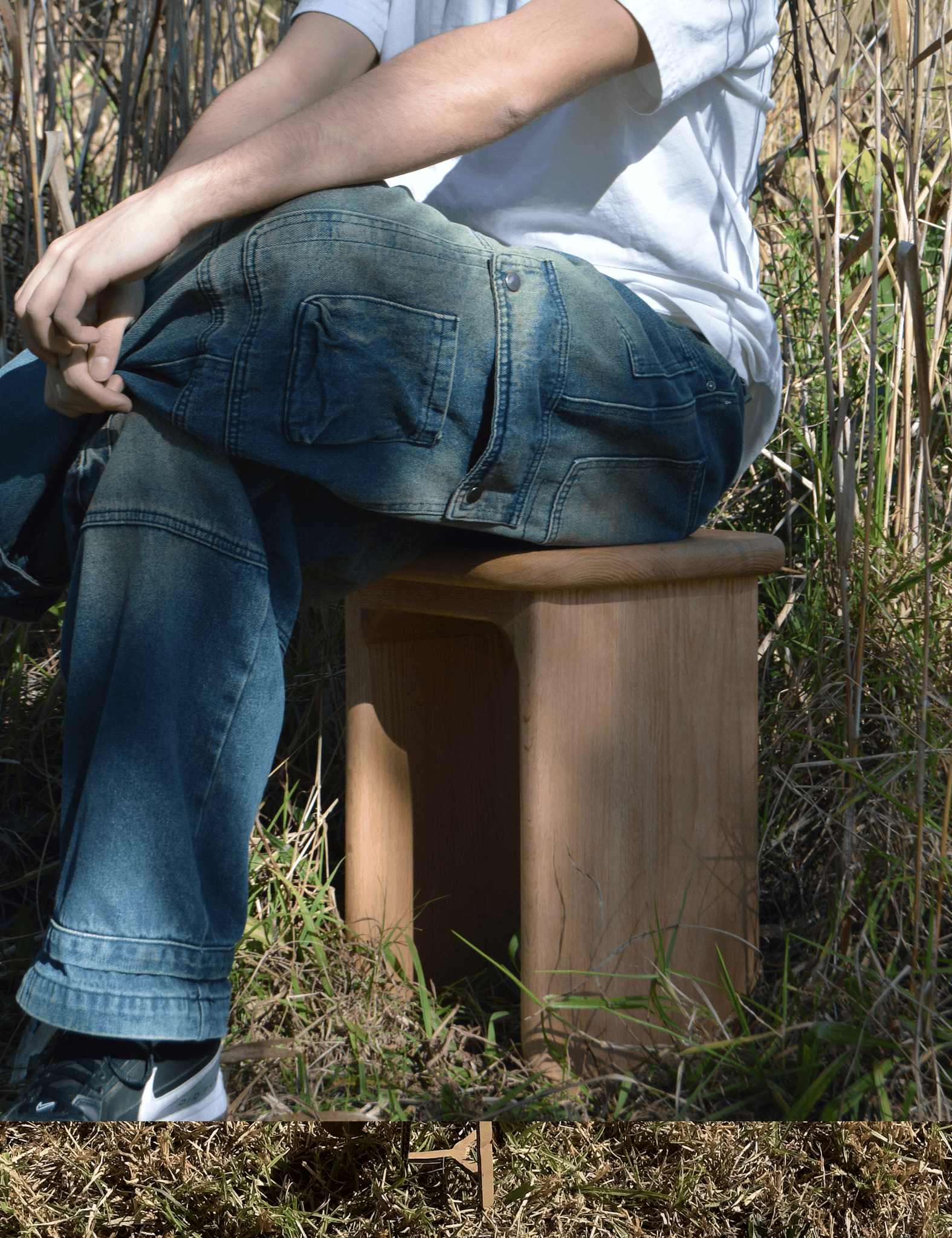 Streetside billboard with flyposters of the Batch.Works brand and illustrations