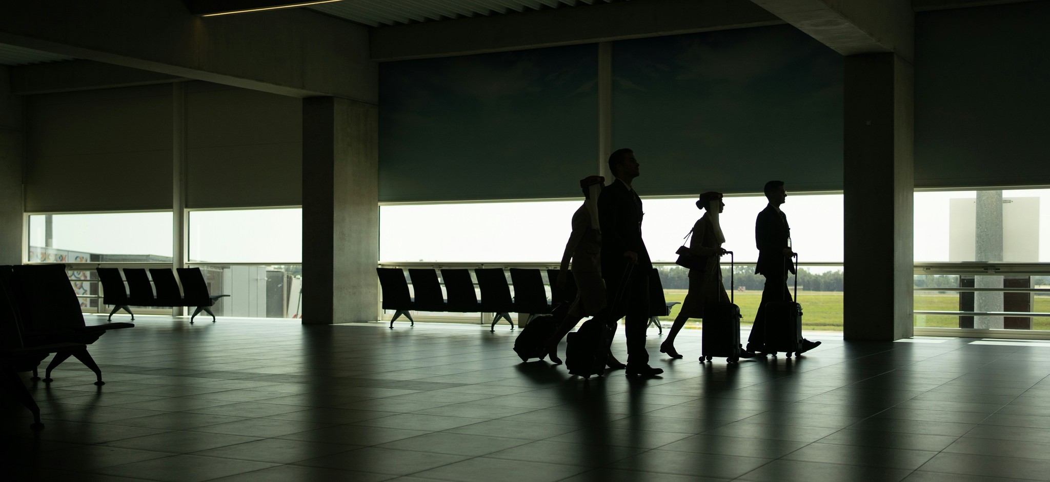 people sitting on chair in front of laptop computers