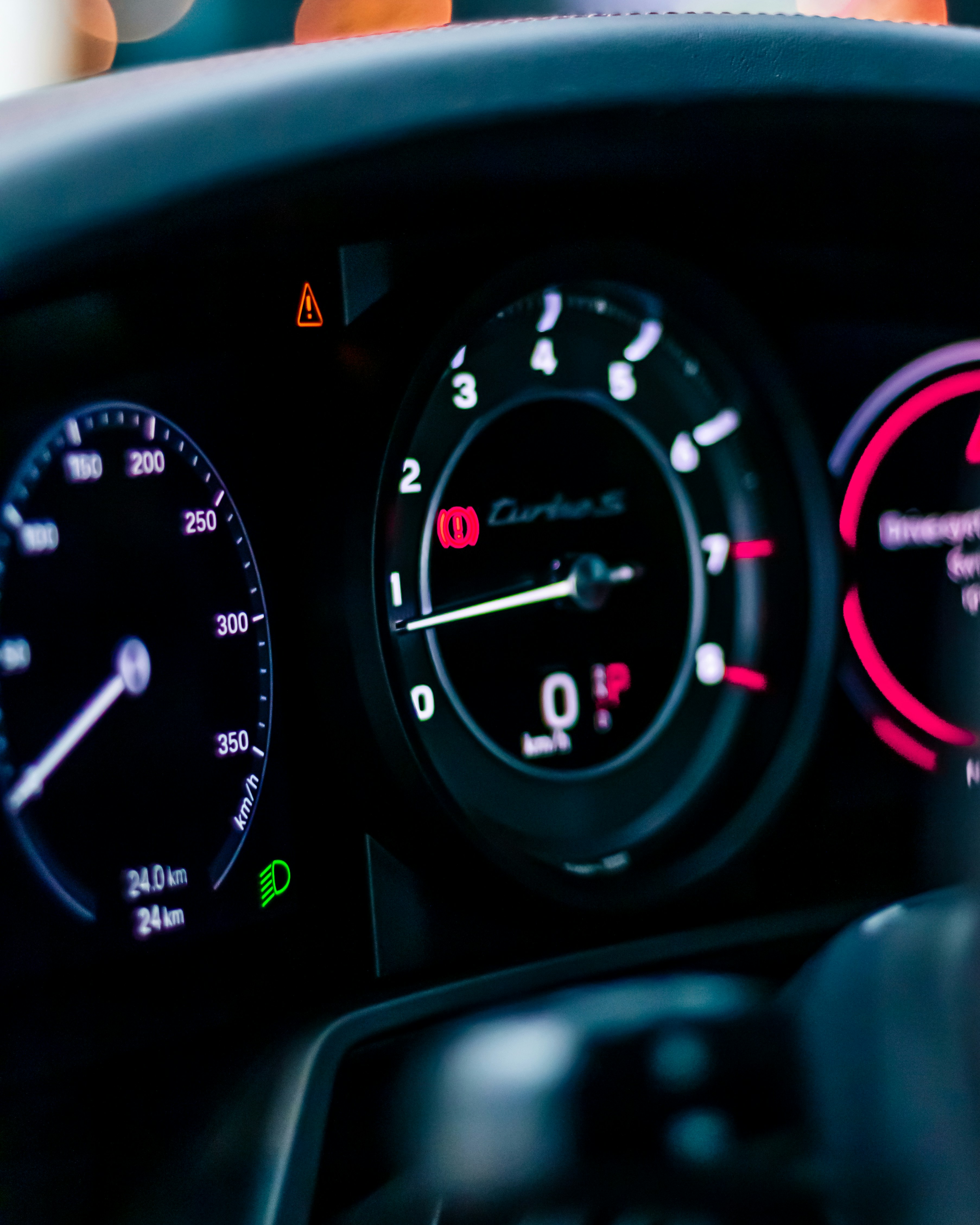a close up of a speedometer on a car dashboard