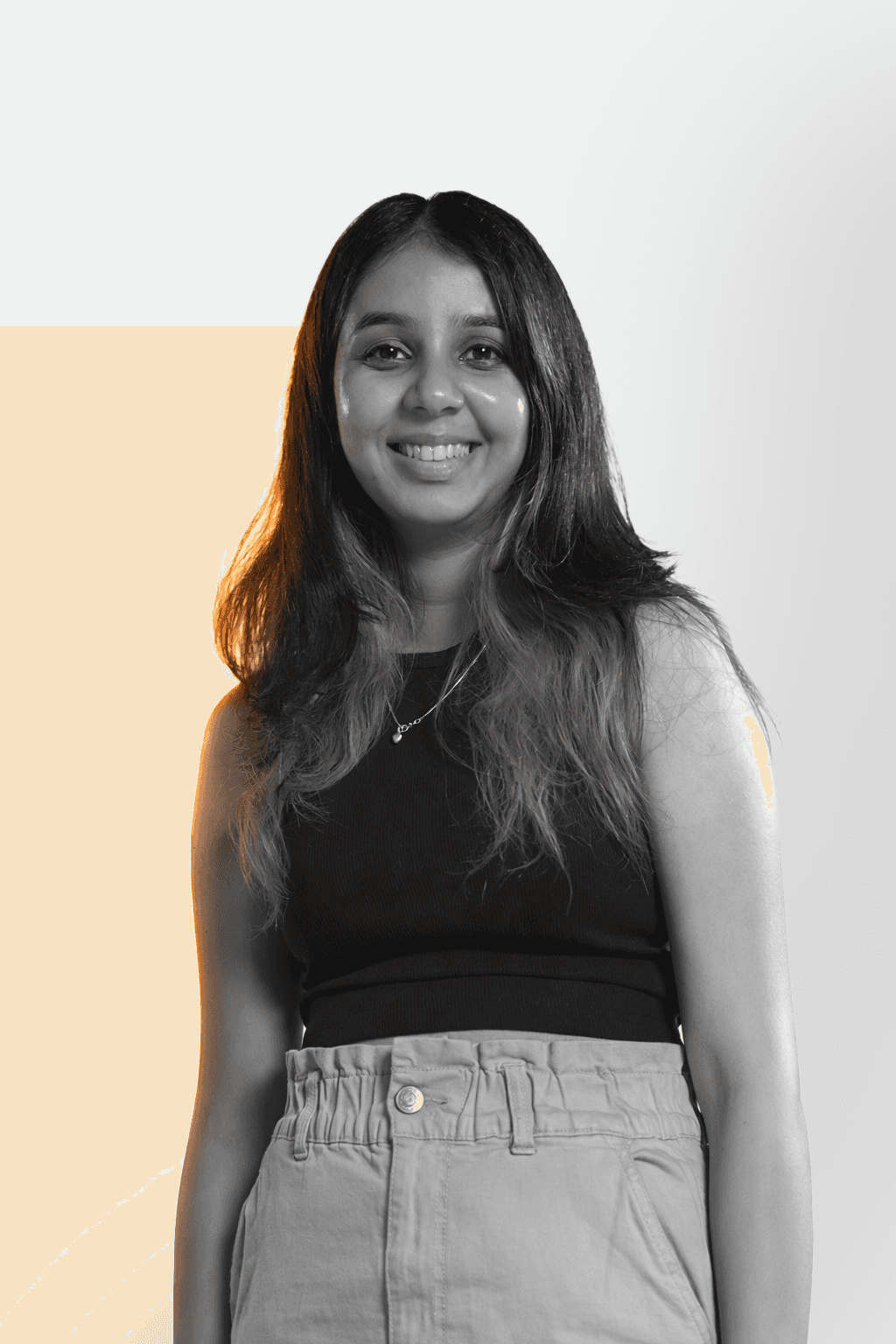 a woman with an afro is looking at the camera