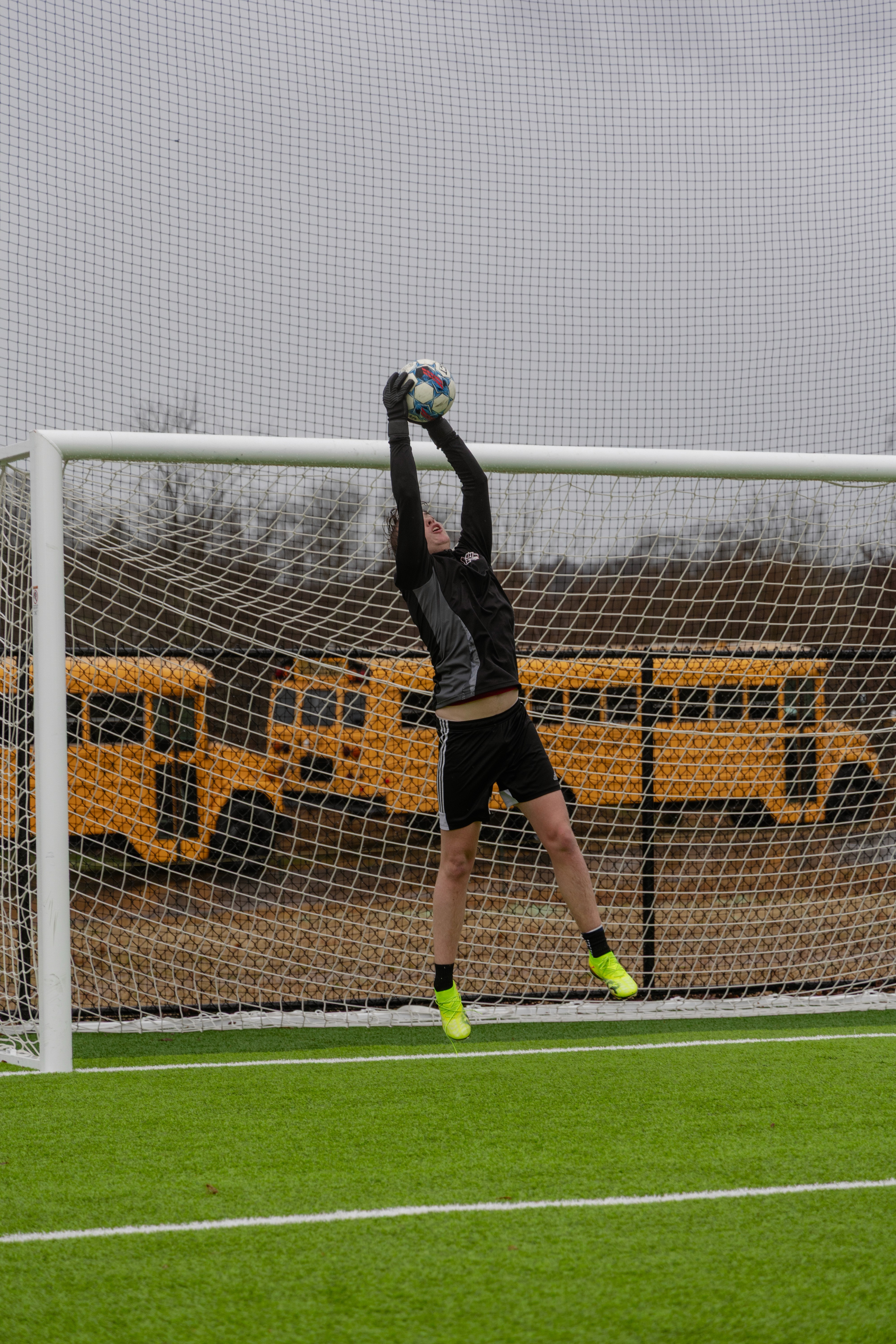 man in white crew neck shirt wearing black framed eyeglasses