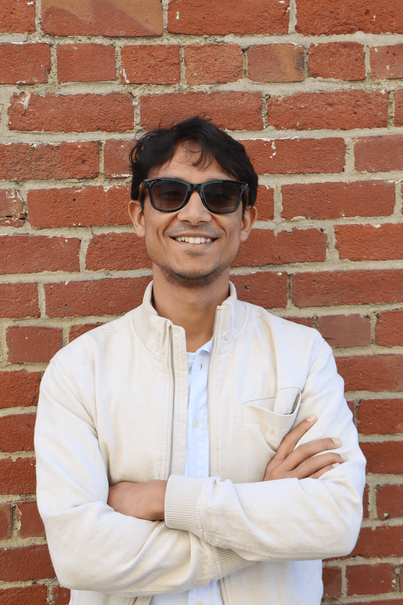 man standing beside wall