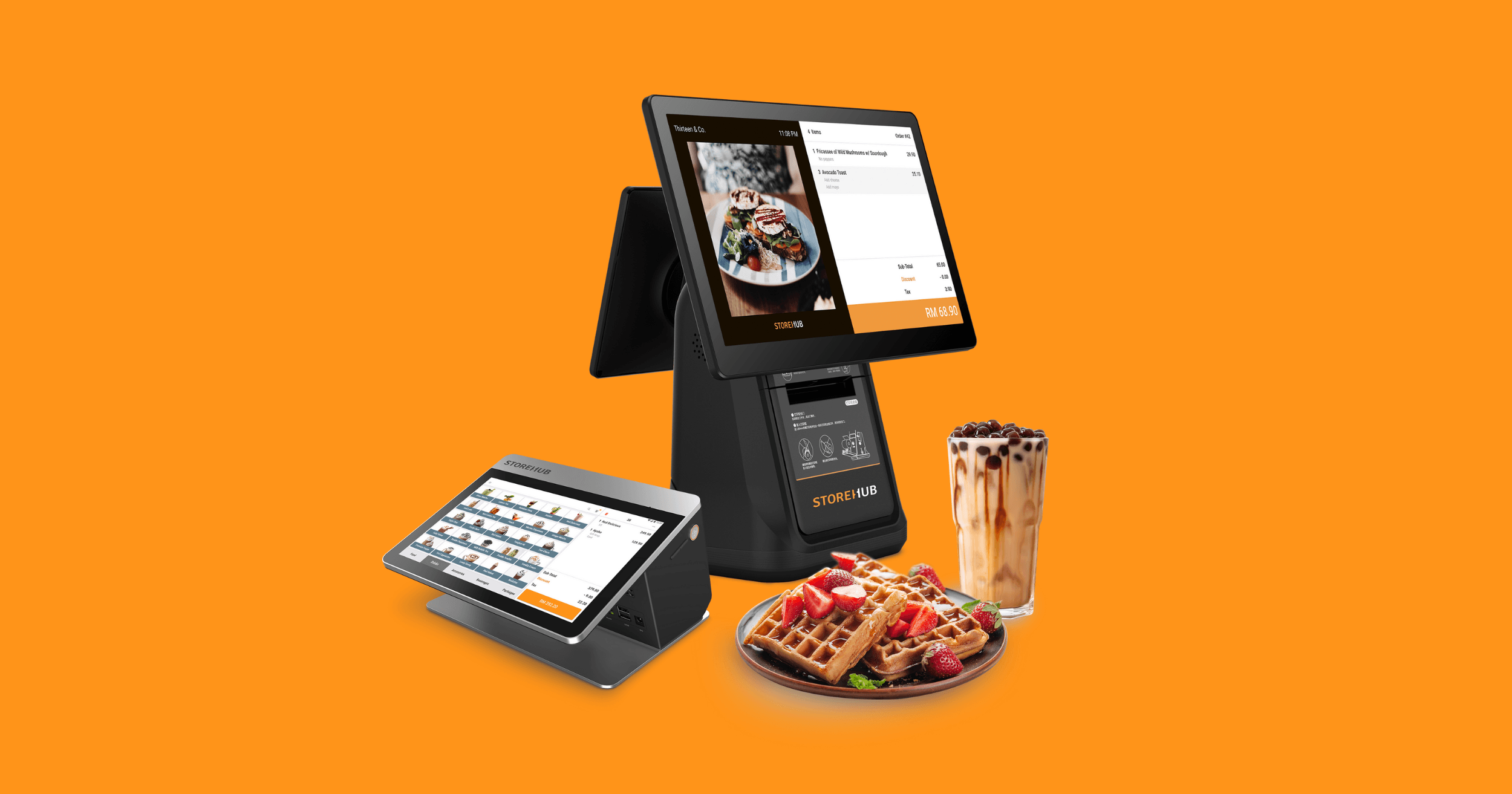 A photo of two StoreHub POS Systems