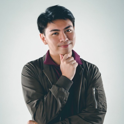 smiling woman wearing white and black pinstriped collared top