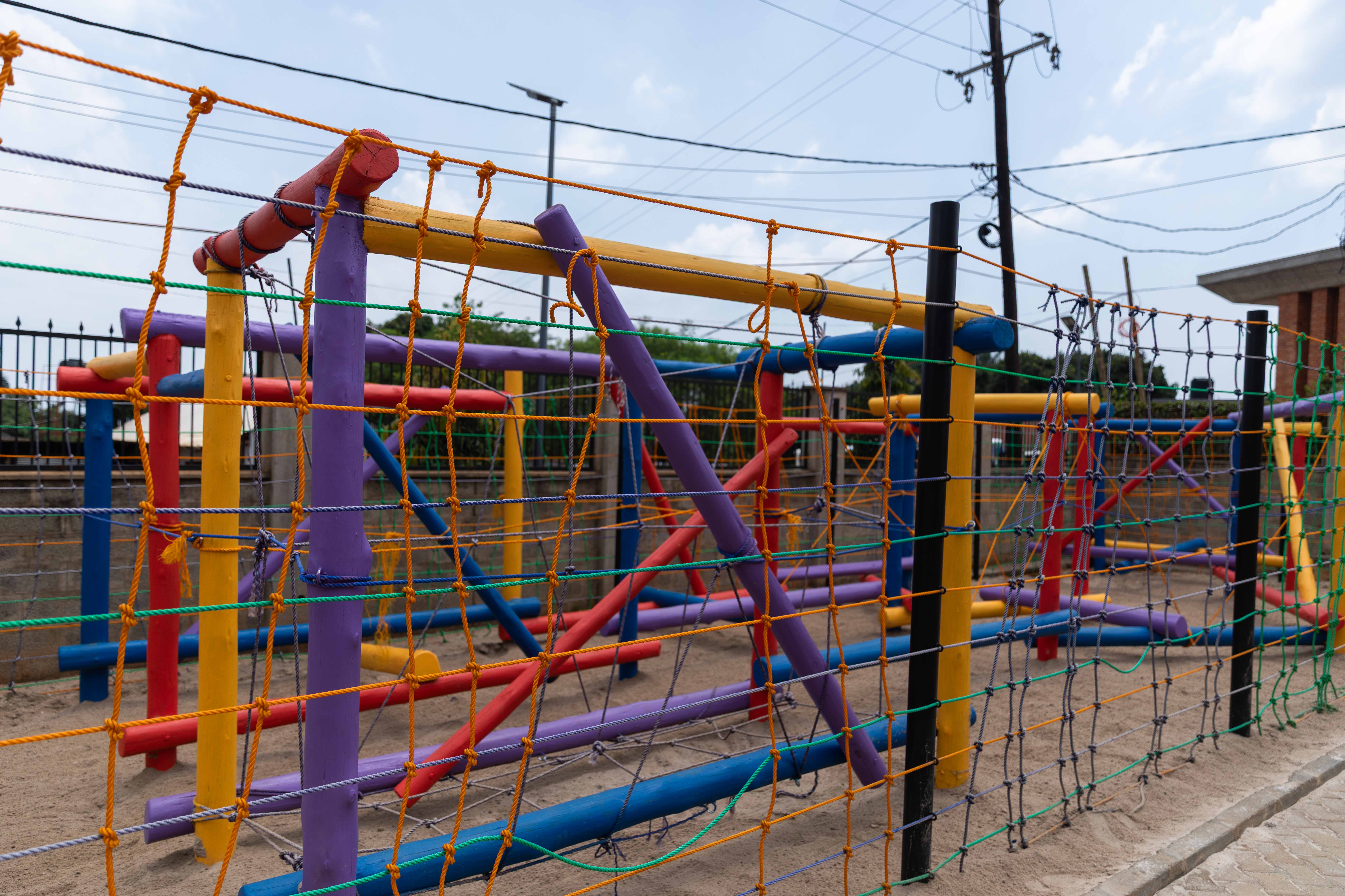 A student stands with a backpack on, ready for school