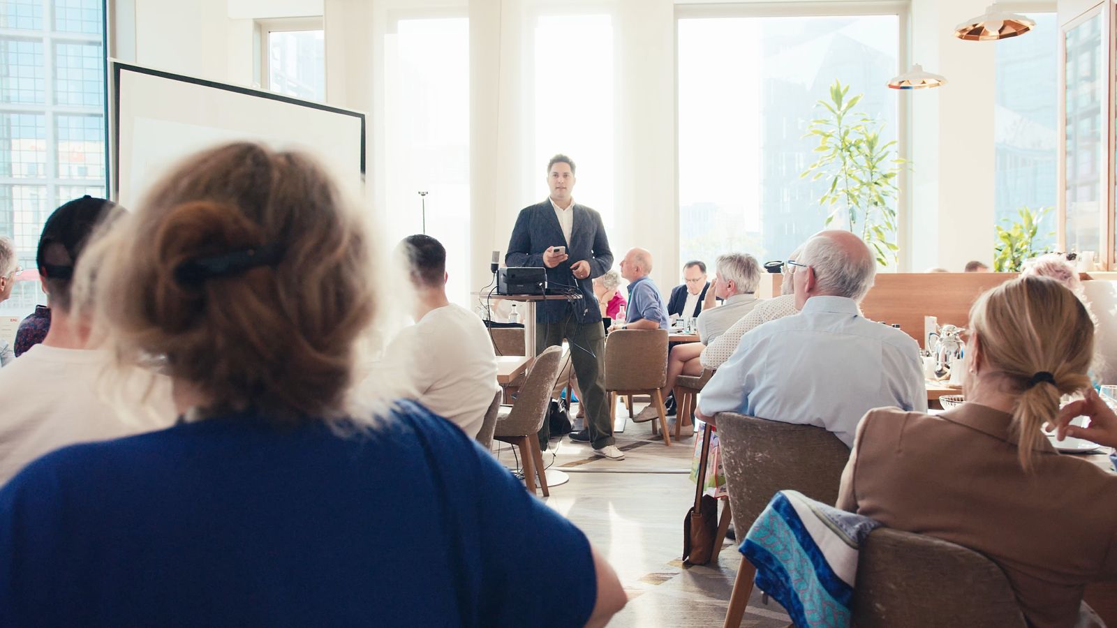 Founder presenting a StoryOS session on strategic narrative alignment to a startup audience