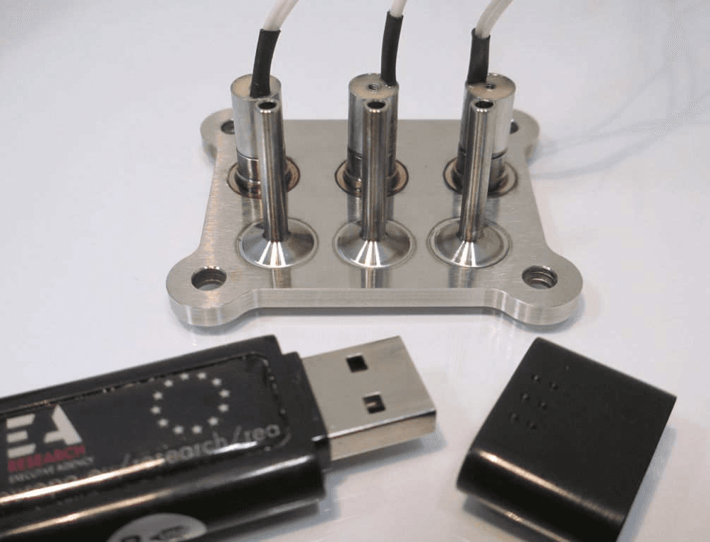 Figure 2: uFCU EQM 02 in comparison to the size of a USB stick