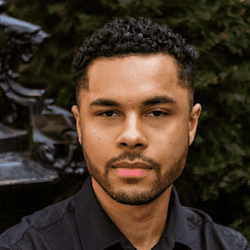 Senior male executive in a dark suit.