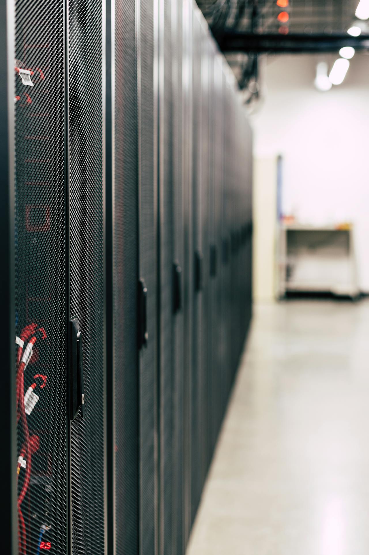 Rows of server racks in a data centre, representing separated storage and recoverability.