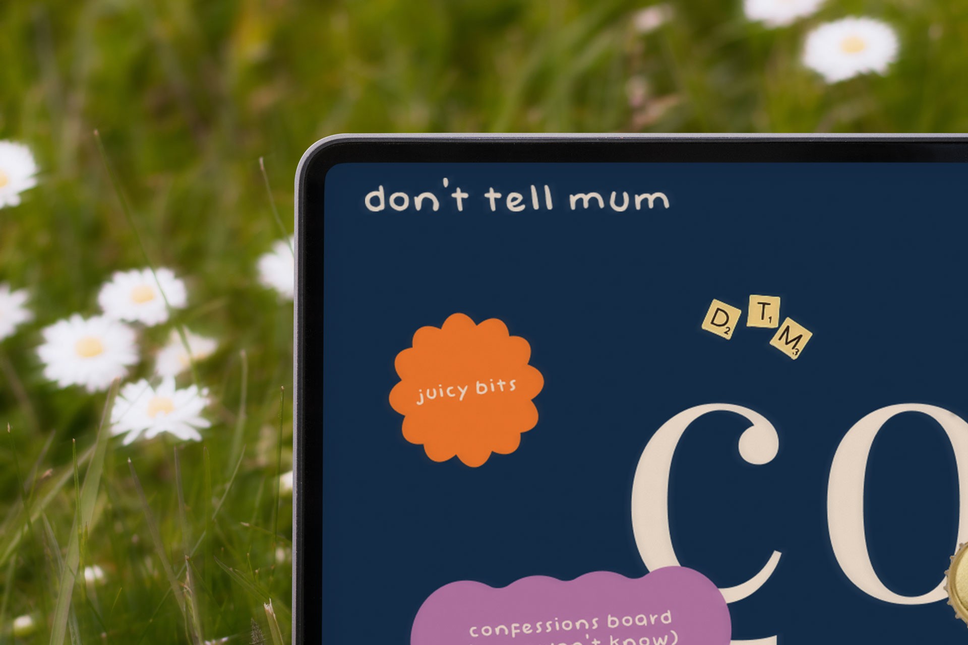 A close up of the 'Don't Tell Mum' website displayed on a laptop screen.