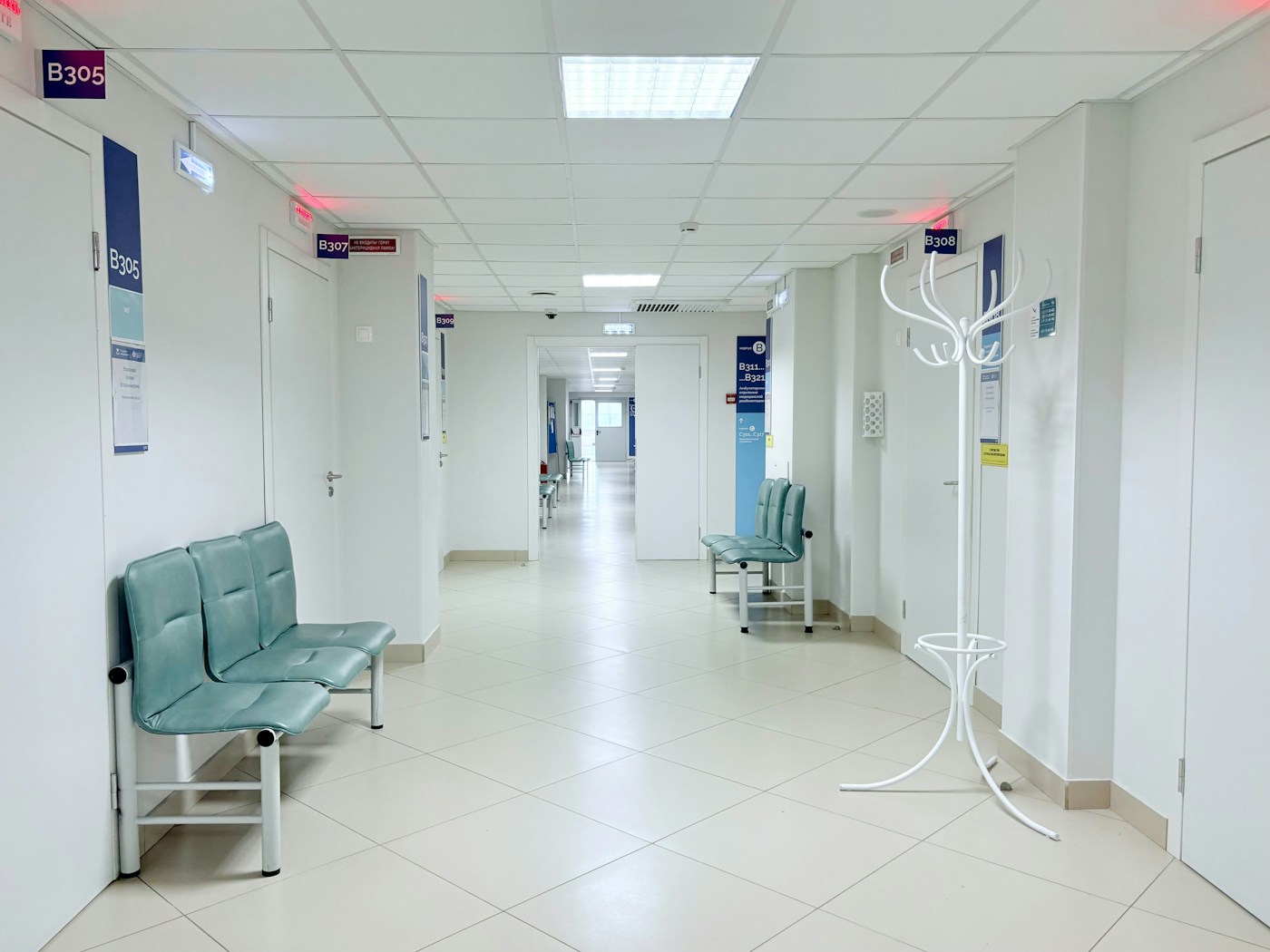 Quiet, freshly redesigned hospital outpatient corridor in daylight
